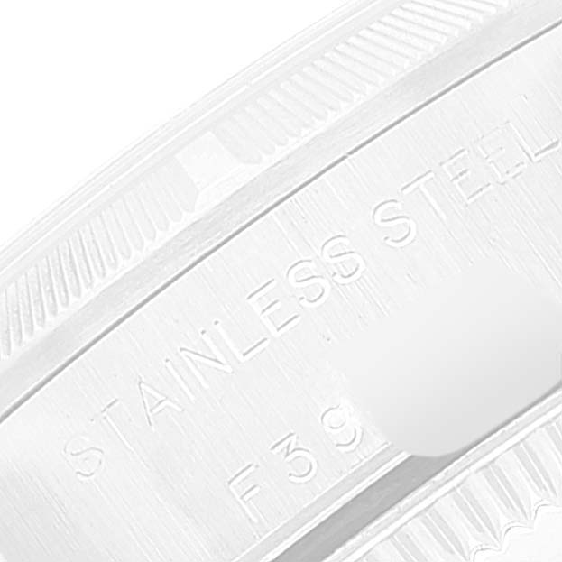 This image shows a close-up of the side engraving on a Rolex Oyster Perpetual 76030 Women
s Stainless Steel Blue Dial 76030 Women
s Stainless Steel Blue Dial watch, highlighting the text "STAINLESS STEEL."