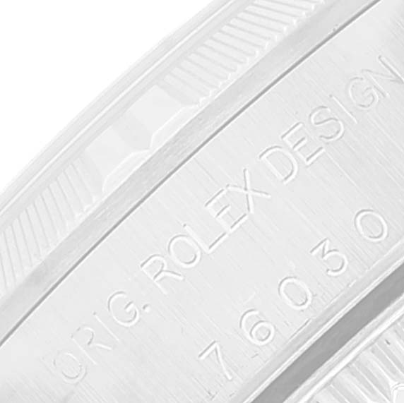 This close-up shows the engraved inner bezel of a Rolex Oyster Perpetual 76030 Women
s Stainless Steel Blue Dial 76030 Women
s Stainless Steel Blue Dial watch.