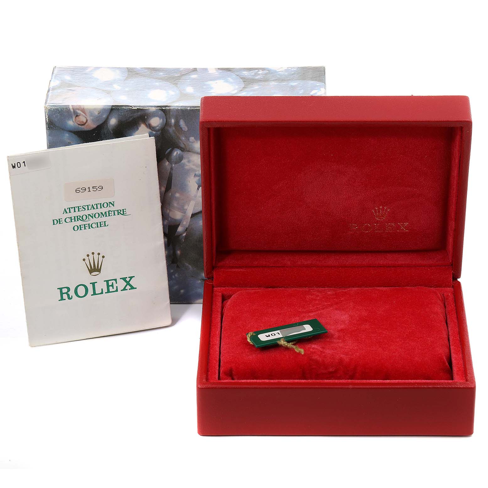 The image shows the packaging, including the booklet, box, and cushion for the Rolex President 69159 Women's White Gold Silver Dial 69159 Women's White Gold Silver Dial model watch.