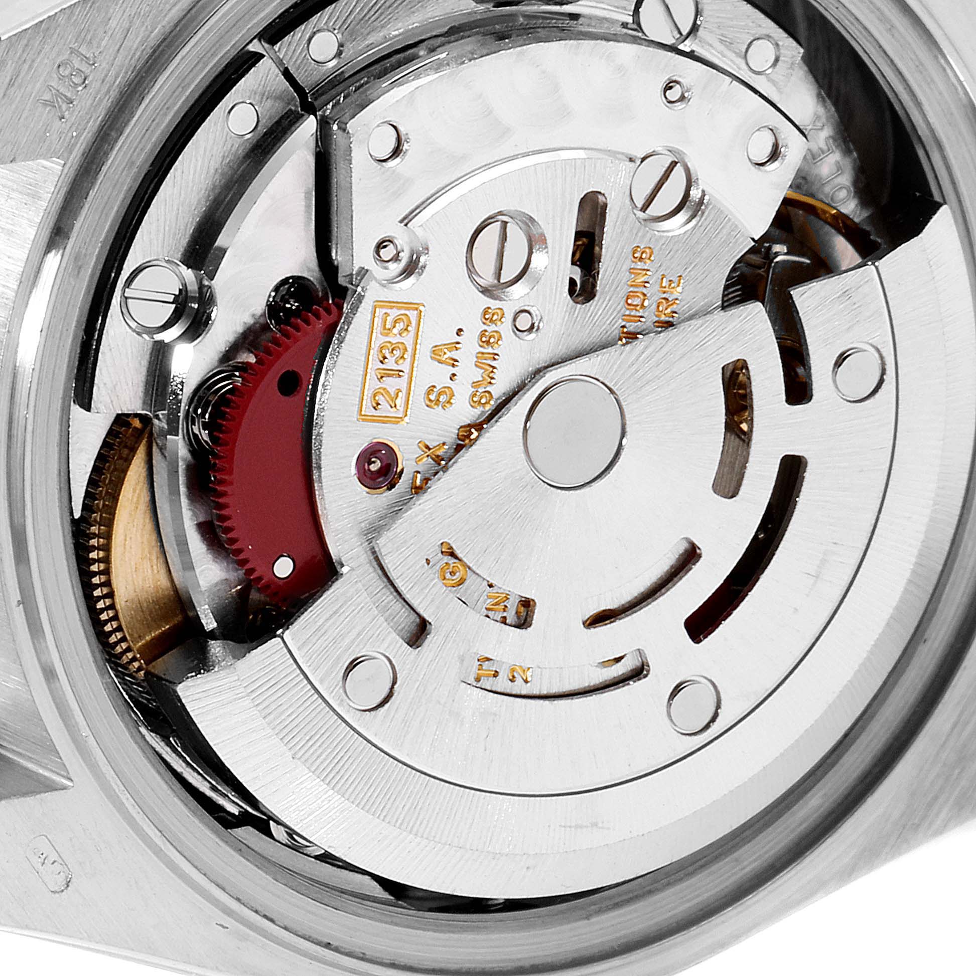 This image shows a close-up view of the movement mechanism of a Rolex President 69159 Women's White Gold Silver Dial 69159 Women's White Gold Silver Dial watch.