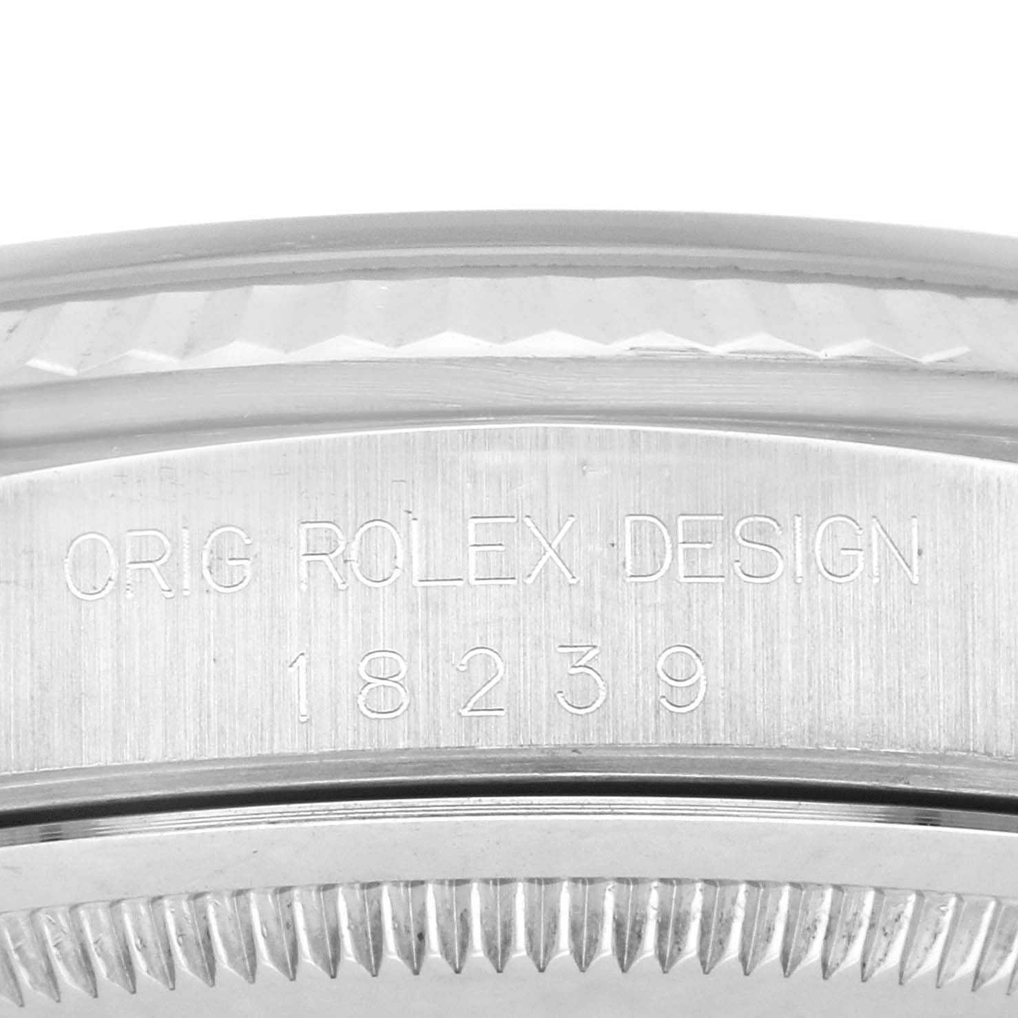 The image shows an angled view of the engraved side of a Rolex President 18239A Men's White Gold Black Dial 18239A Men's White Gold Black Dial watch, displaying "ORIG ROLEX DESIGN 18239".
