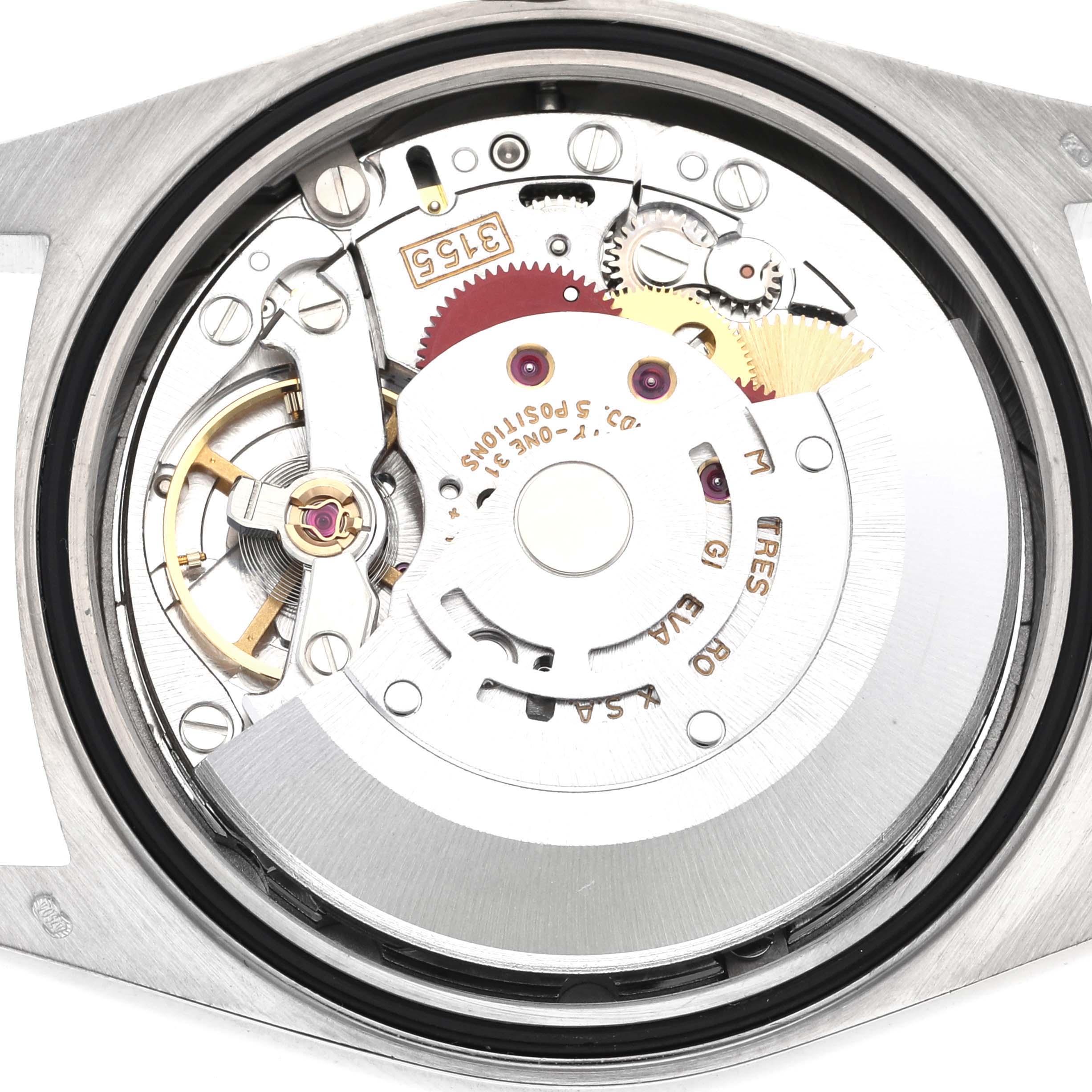 The Rolex President 18239A Men's White Gold Black Dial 18239A Men's White Gold Black Dial model is shown from the back, displaying its intricate internal movement and components.