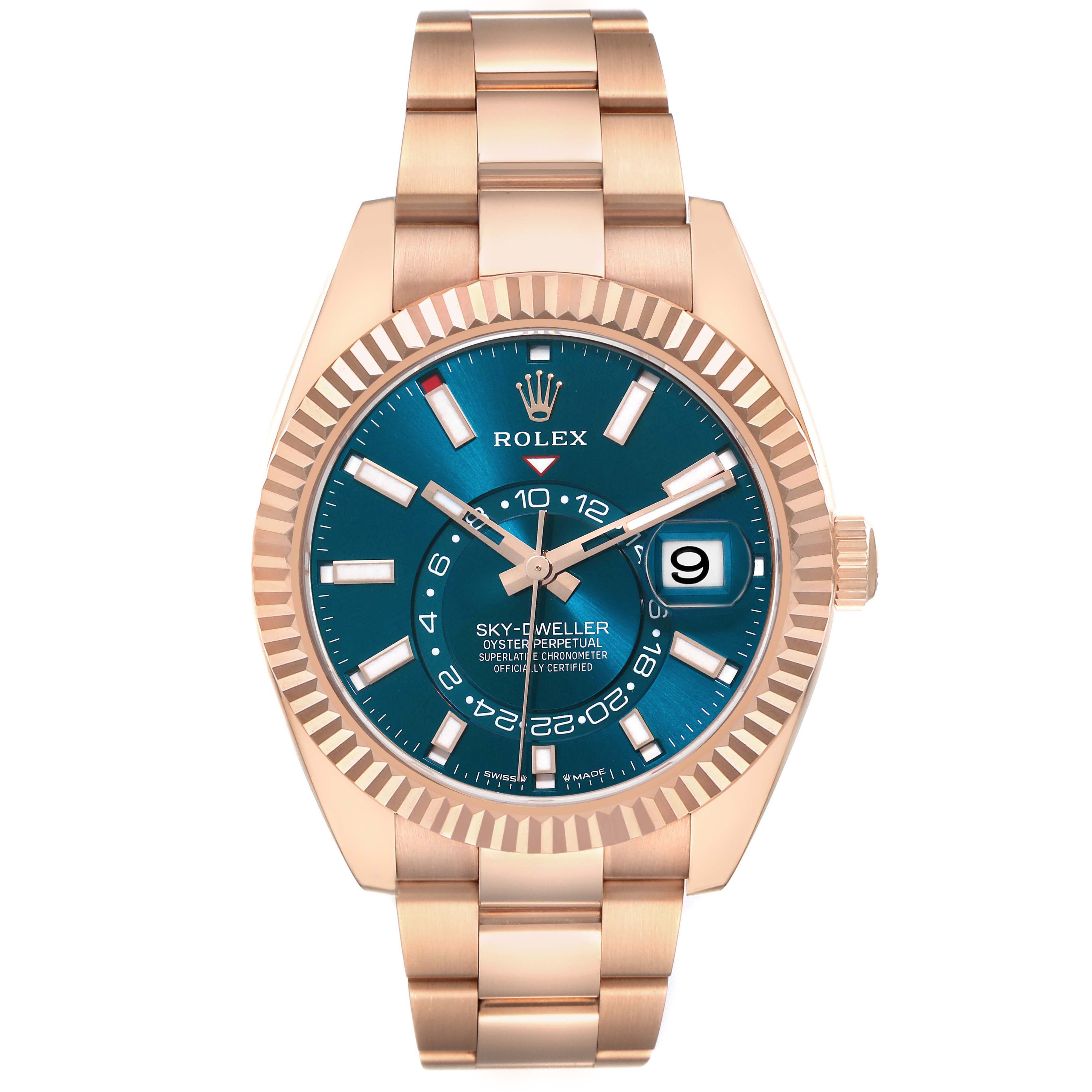 The Rolex Sky-Dweller 336935 Men's Rose Gold Blue Dial is shown from the front, displaying the entire watch face, bezel, and part of the bracelet.