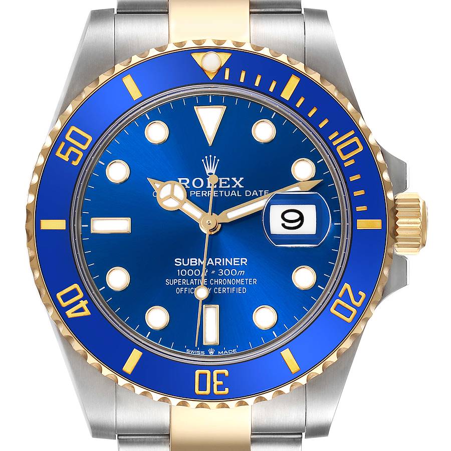 The Rolex Submariner watch is shown from the front, highlighting its blue dial, bezel, and date window.