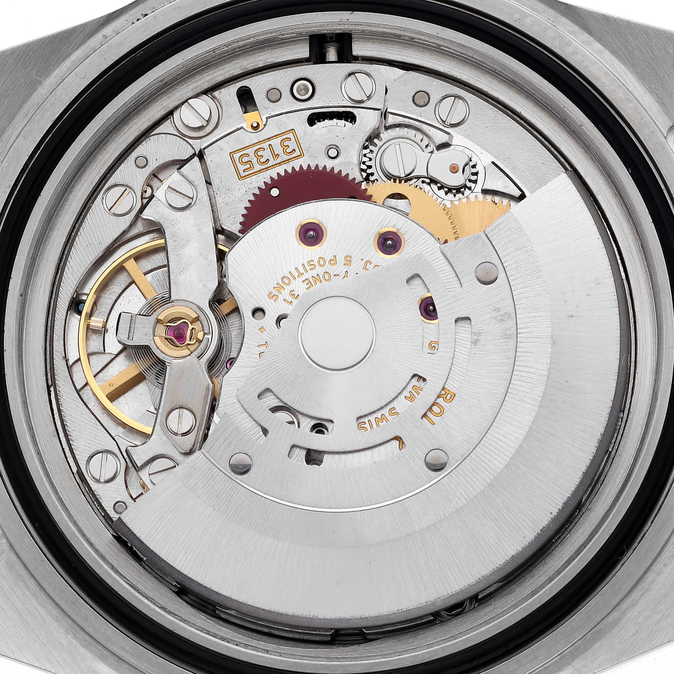 The image shows the movement mechanism of a Rolex Submariner 16613 Men's Steel and Gold (two tone) Blue Dial 16613 Men's Steel and Gold (two tone) Blue Dial, viewed from the back, highlighting gears and engravings.