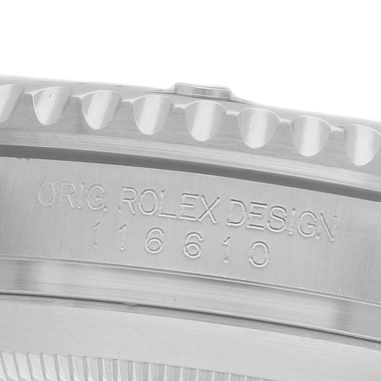 The image shows a close-up of the side case engraving on a Rolex Submariner 116610LV Men's Stainless Steel Green Dial, highlighting the model number.