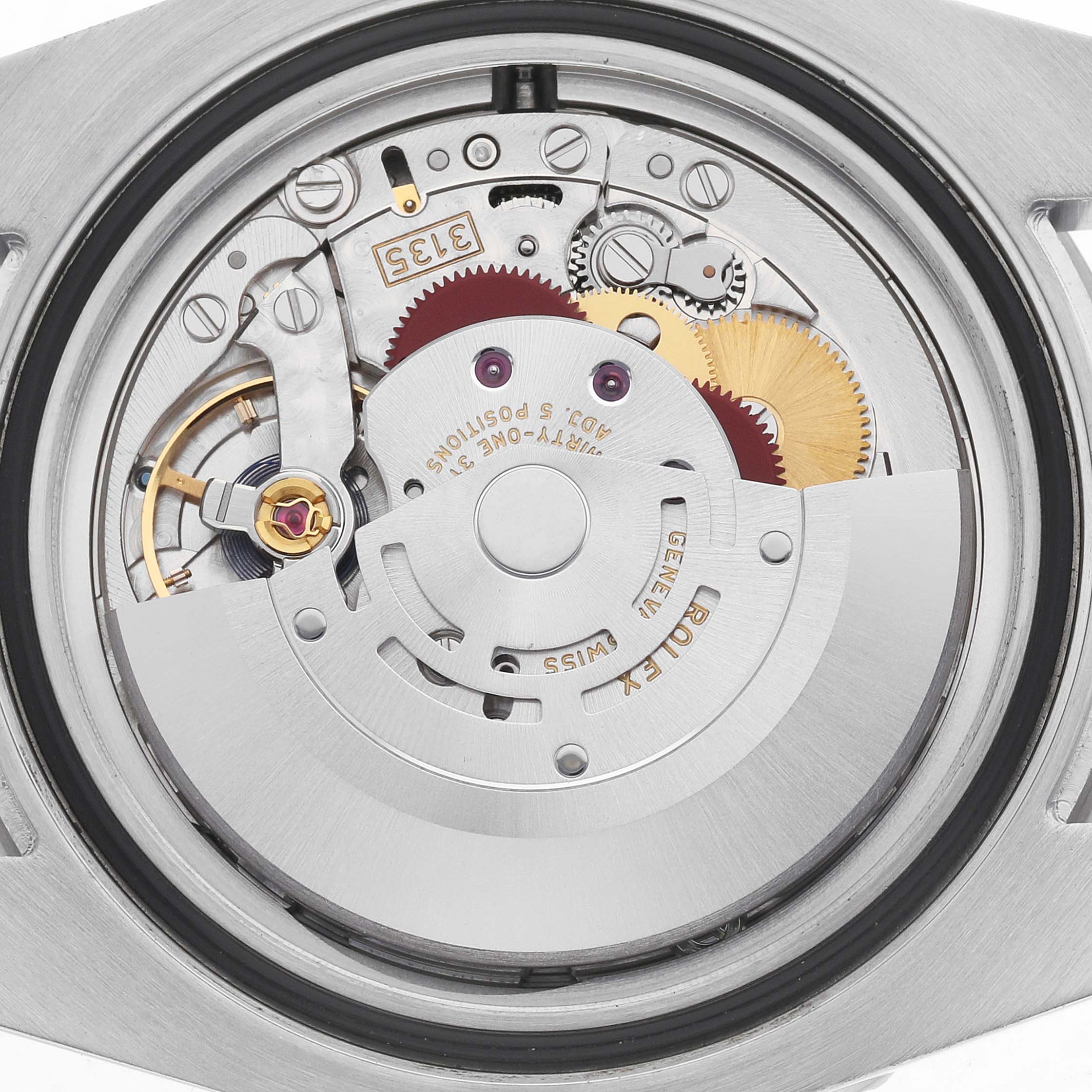 The image shows the movement of a Rolex Submariner 116610LV Men's Stainless Steel Green Dial watch from the back, displaying the intricate gears and components.