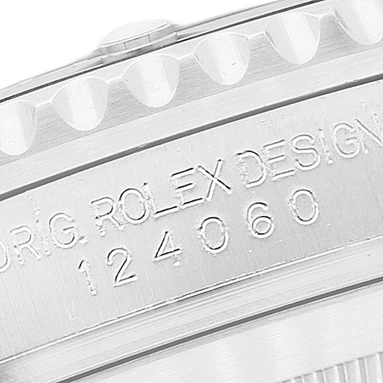 This image shows a close-up of the engraved details on the side of a Rolex Submariner 124060 Men's Stainless Steel Black Dial 124060 Men's Stainless Steel Black Dial watch.