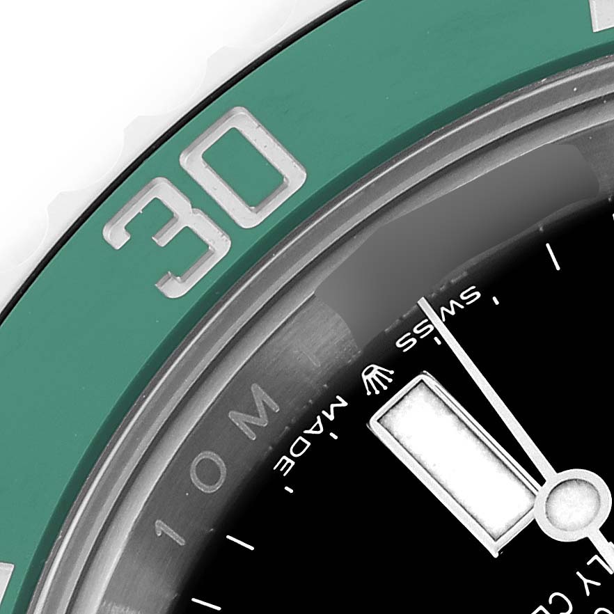 The image shows a close-up of the green bezel and part of the dial and hands of a Rolex Submariner 126610LV Men's Stainless Steel Black Dial 126610LV Men's Stainless Steel Black Dial.