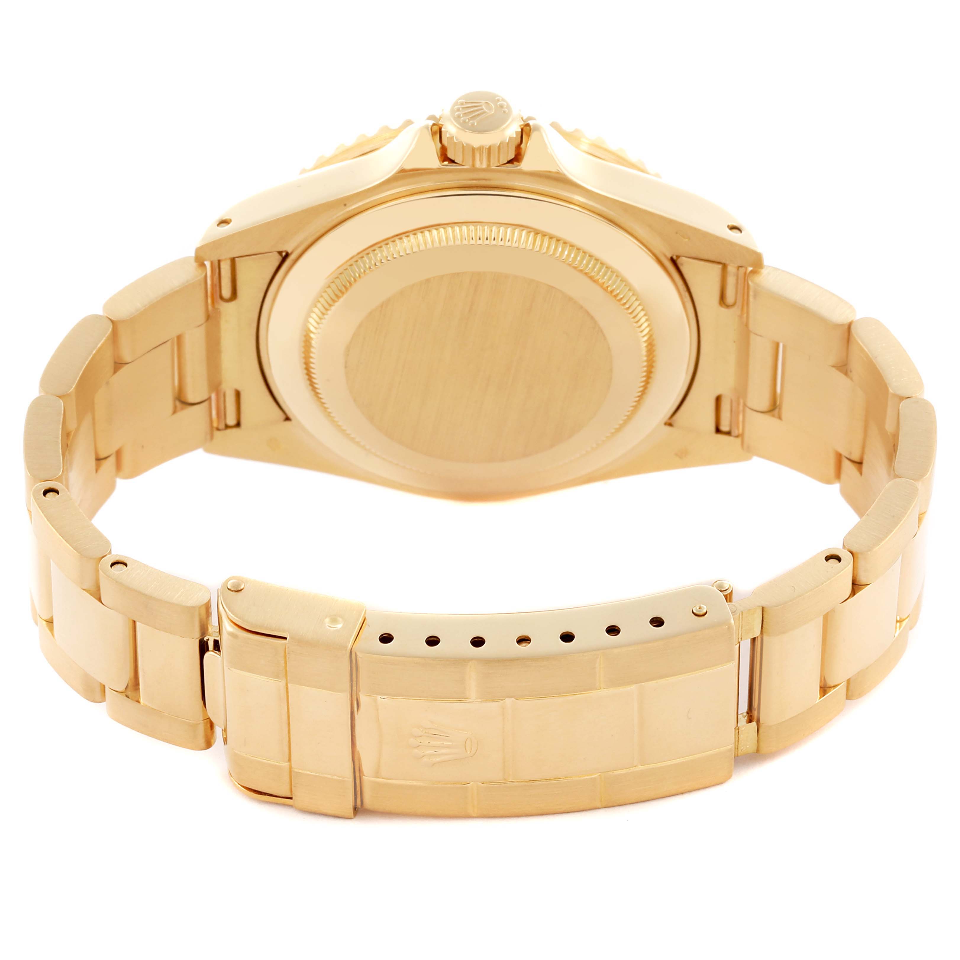 The image shows the back case and bracelet clasp of a Rolex Submariner 16618 Men
s Yellow Gold Black Dial 16618 Men
s Yellow Gold Black Dial.