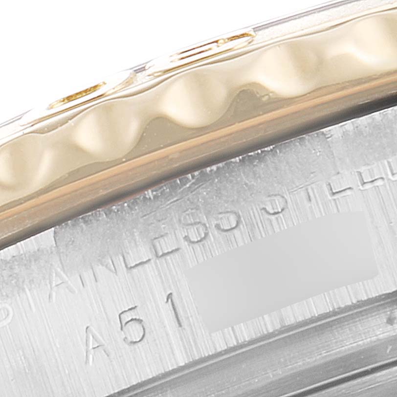 This is a close-up angle of the bezel and part of the case on a Rolex Yacht-Master 169623 Women
s Steel and Gold (two tone) White Dial 169623 Women
s Steel and Gold (two tone) White Dial watch.