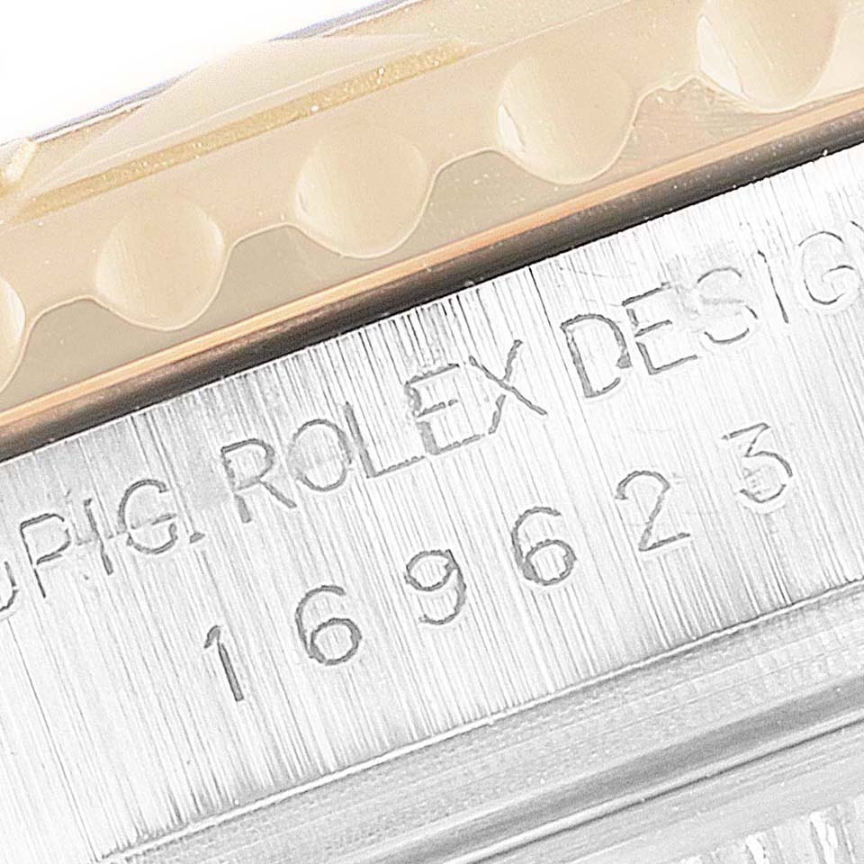 The image shows a close-up angle of the bezel and engraved model number on the side of a Rolex Yacht-Master 169623 Women
s Steel and Gold (two tone) White Dial 169623 Women
s Steel and Gold (two tone) White Dial watch.
