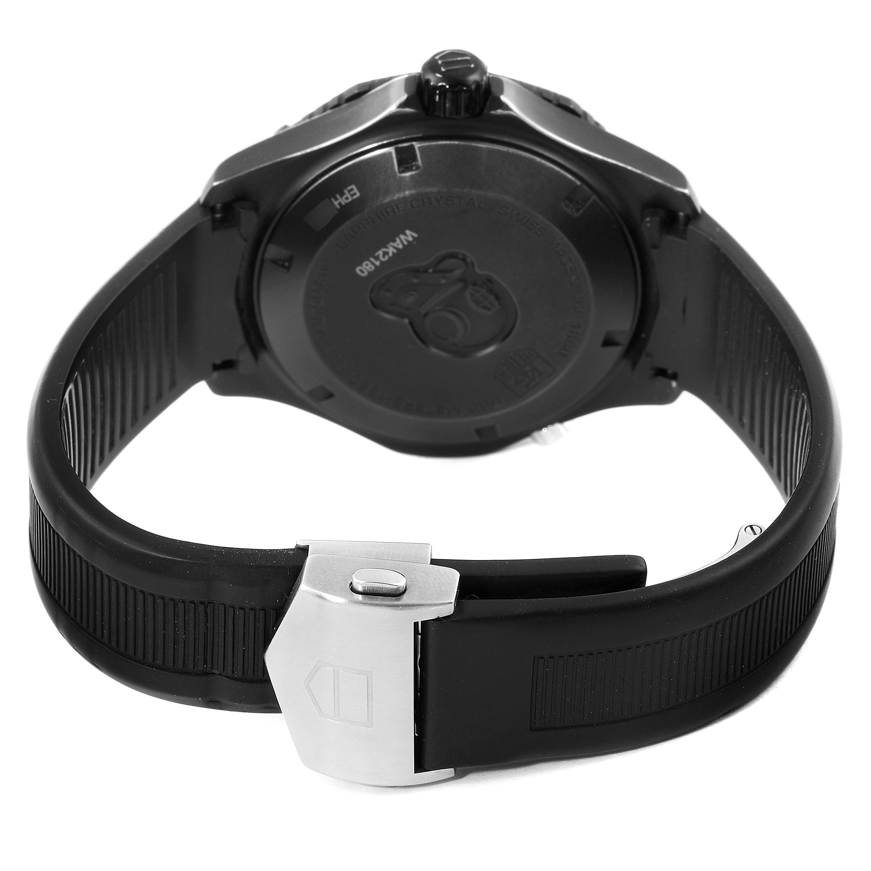 The image shows the back case, crown, and rubber strap with a clasp of the Tag Heuer Aquaracer WAK2180.FT6027 Men's Titanium Black Dial WAK2180.FT6027 Men's Titanium Black Dial watch from a rear angle.