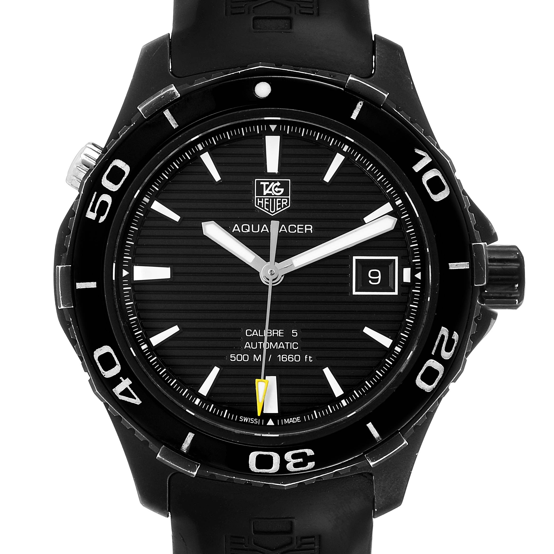 The image shows a front view of a Tag Heuer Aquaracer WAK2180.FT6027 Men's Titanium Black Dial WAK2180.FT6027 Men's Titanium Black Dial watch with a black dial and bezel, displaying the time and date.