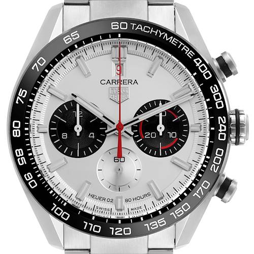 The Tag Heuer Carrera watch is shown from a front angle, highlighting the dial, bezel, and side buttons.