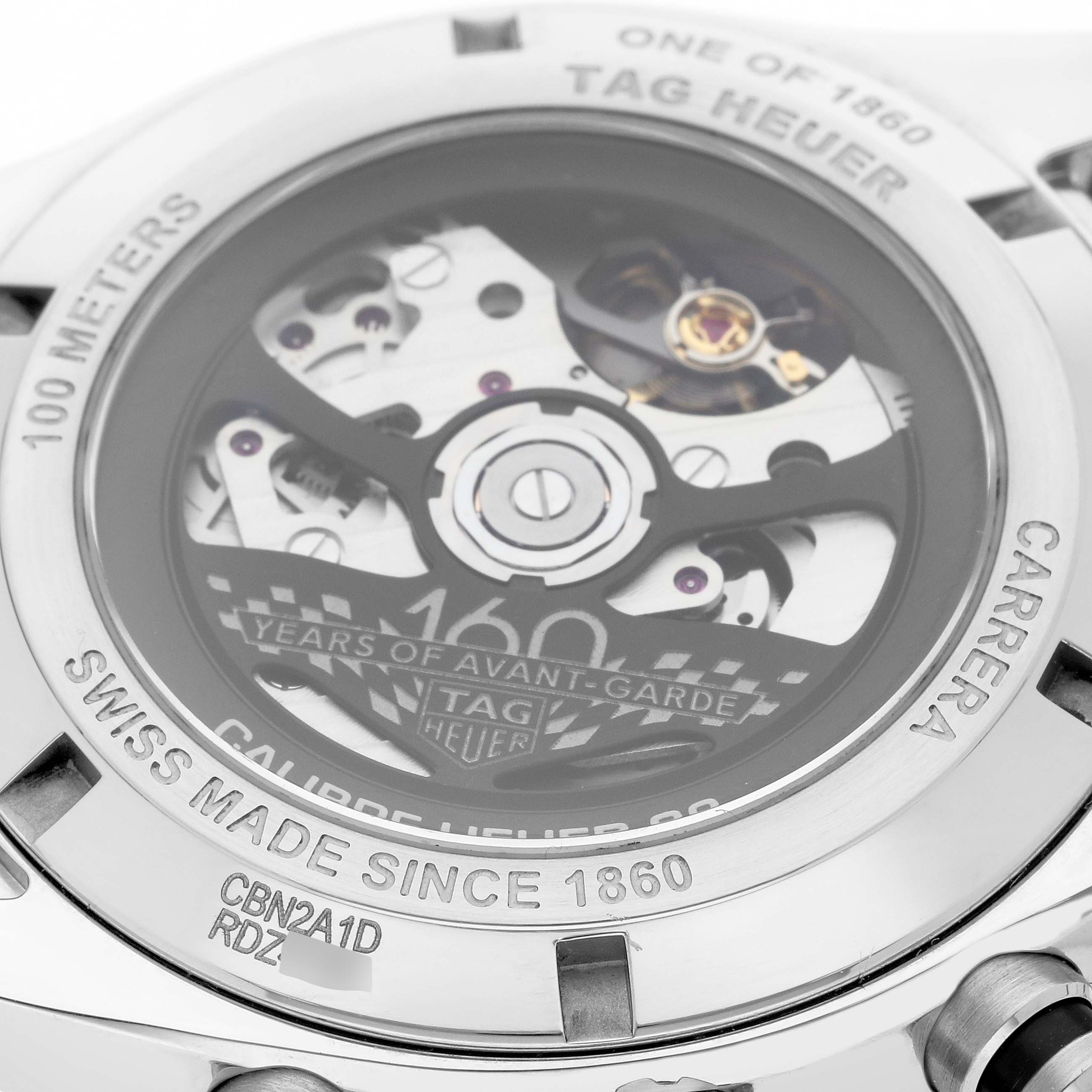 The image shows the back of the Tag Heuer Carrera CBN2A1D.BA0643 Men's Stainless Steel Silver Dial CBN2A1D.BA0643 Men's Stainless Steel Silver Dial watch, highlighting its movement and engravings.