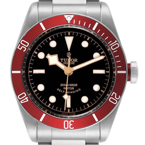 The Tudor Heritage Black Bay watch is shown from the front, highlighting the dial, bezel, and crown.