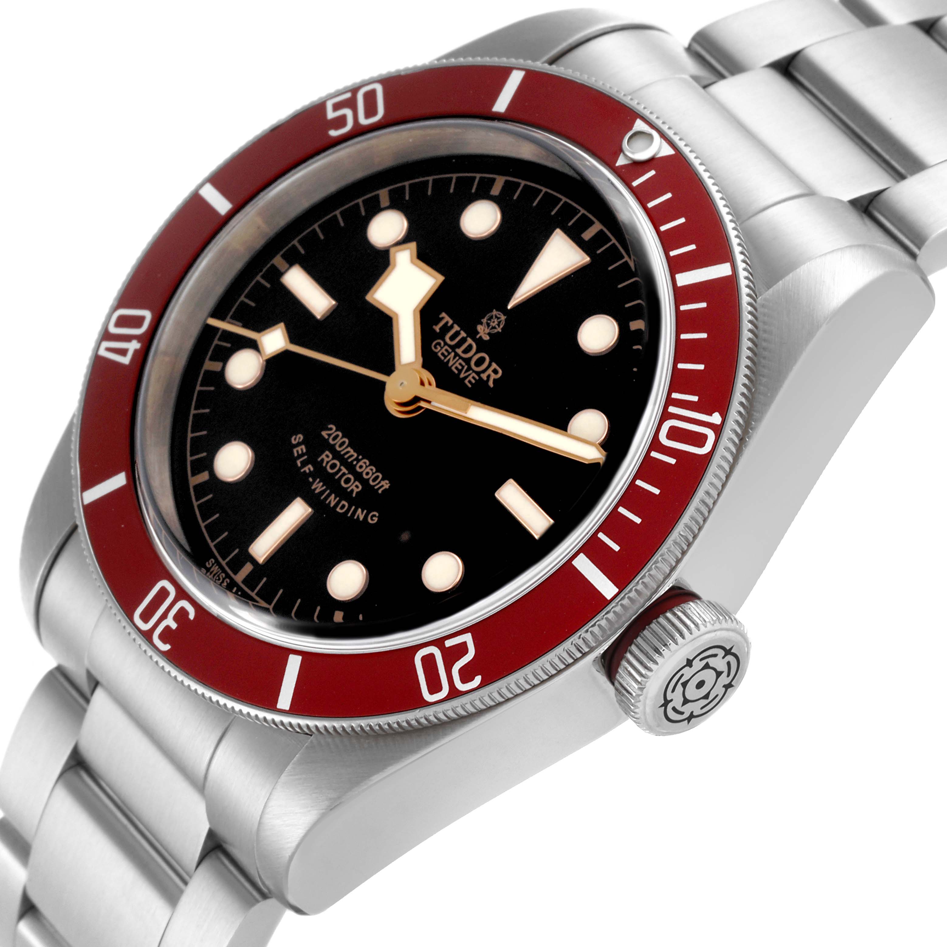 The Tudor Heritage Black Bay 79220R Men
s Stainless Steel Black Dial 79220R Men
s Stainless Steel Black Dial watch is shown at an angle highlighting its face, bezel, crown, and part of the bracelet.