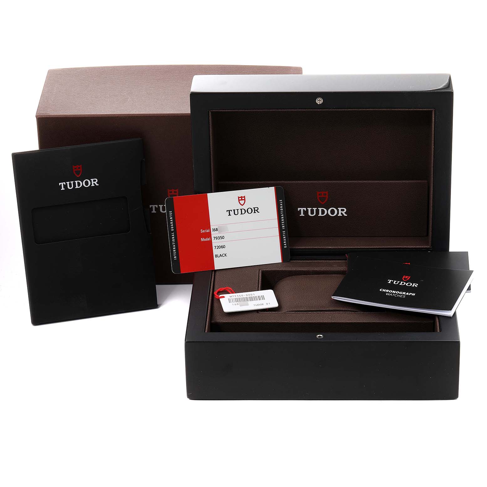 The image shows the packaging, warranty card, and manuals for a Tudor Heritage Black Bay 79350 Men's Stainless Steel Black Dial 79350 Men's Stainless Steel Black Dial watch with an empty watch box and tags.