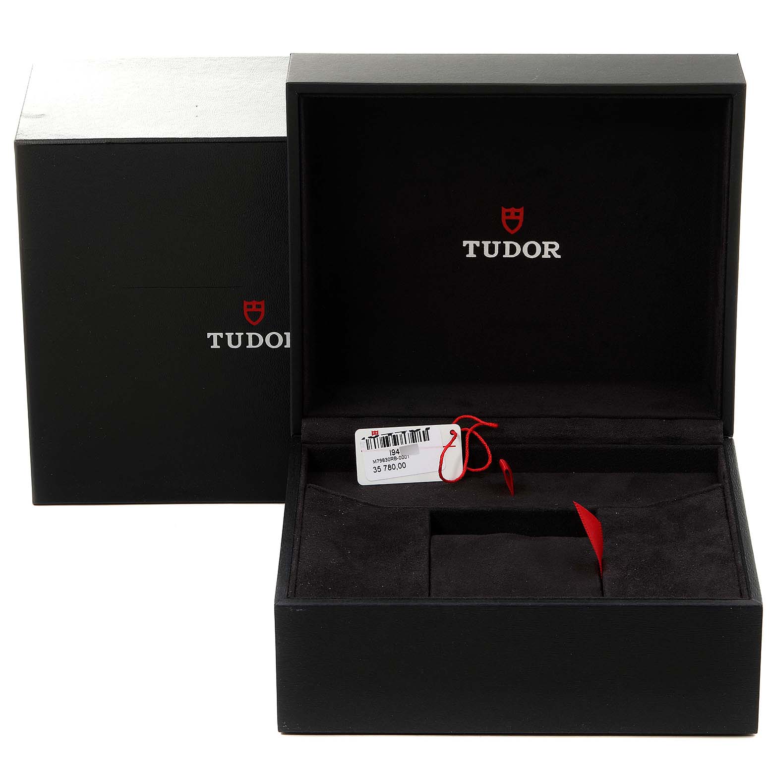 The image shows an open Tudor Heritage Black Bay 79830RB Men
s Stainless Steel Black Dial 79830RB Men
s Stainless Steel Black Dial watch box and packaging.