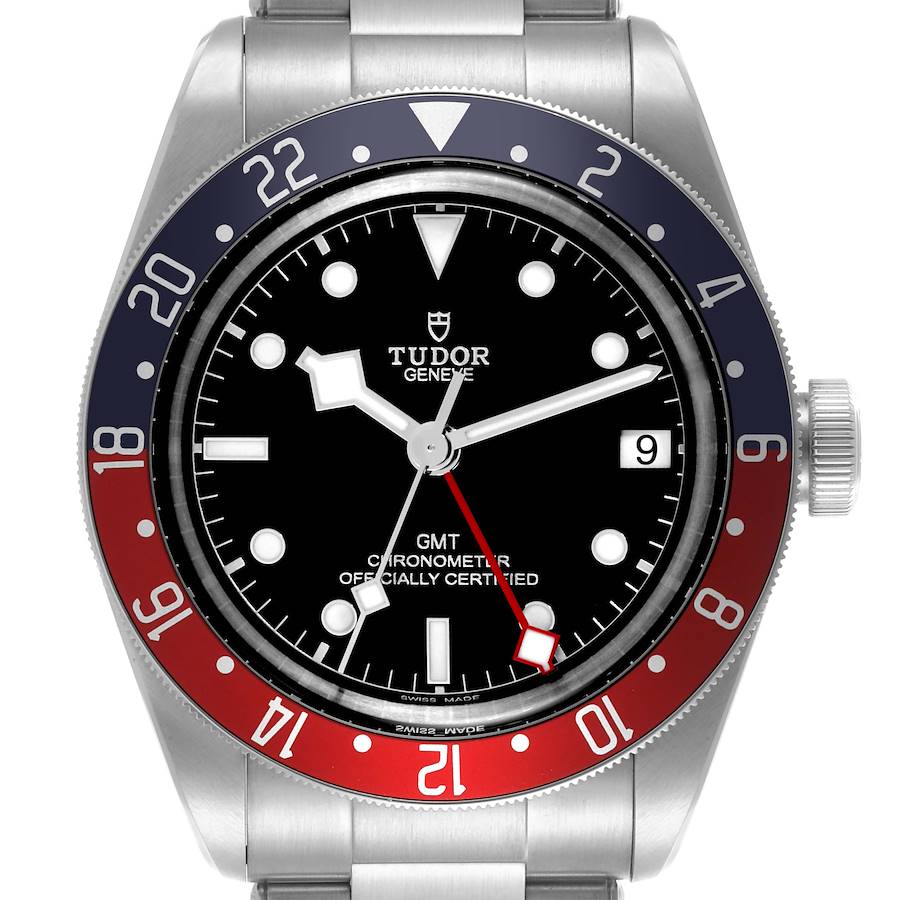 The Tudor Heritage Black Bay watch is shown in a front angle, highlighting the face, bezel, and crown.