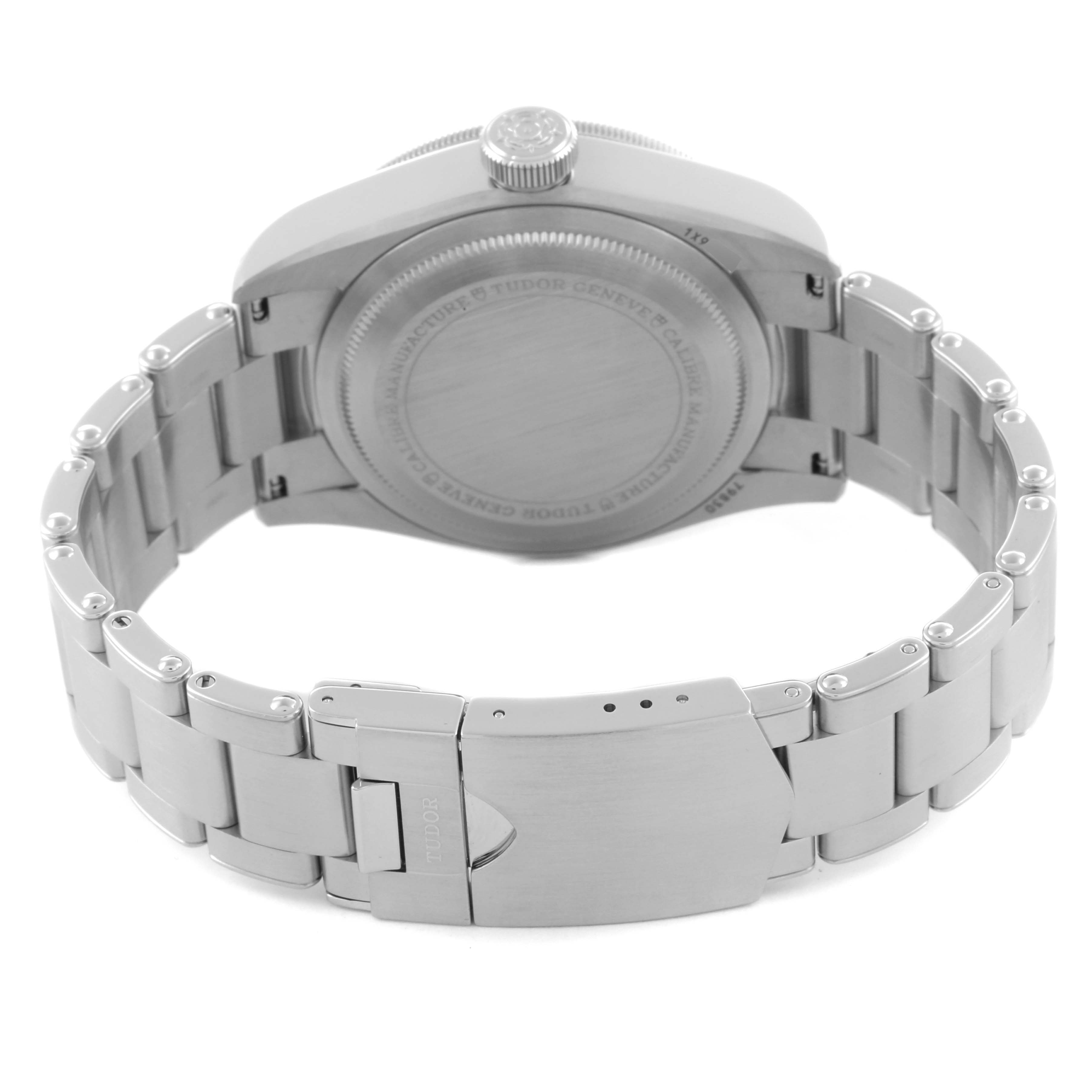 The image shows the back and bracelet of a Tudor Heritage Black Bay 79830RB Men's Stainless Steel Black Dial 79830RB Men's Stainless Steel Black Dial watch, featuring the clasp and case back at a slightly angled view.