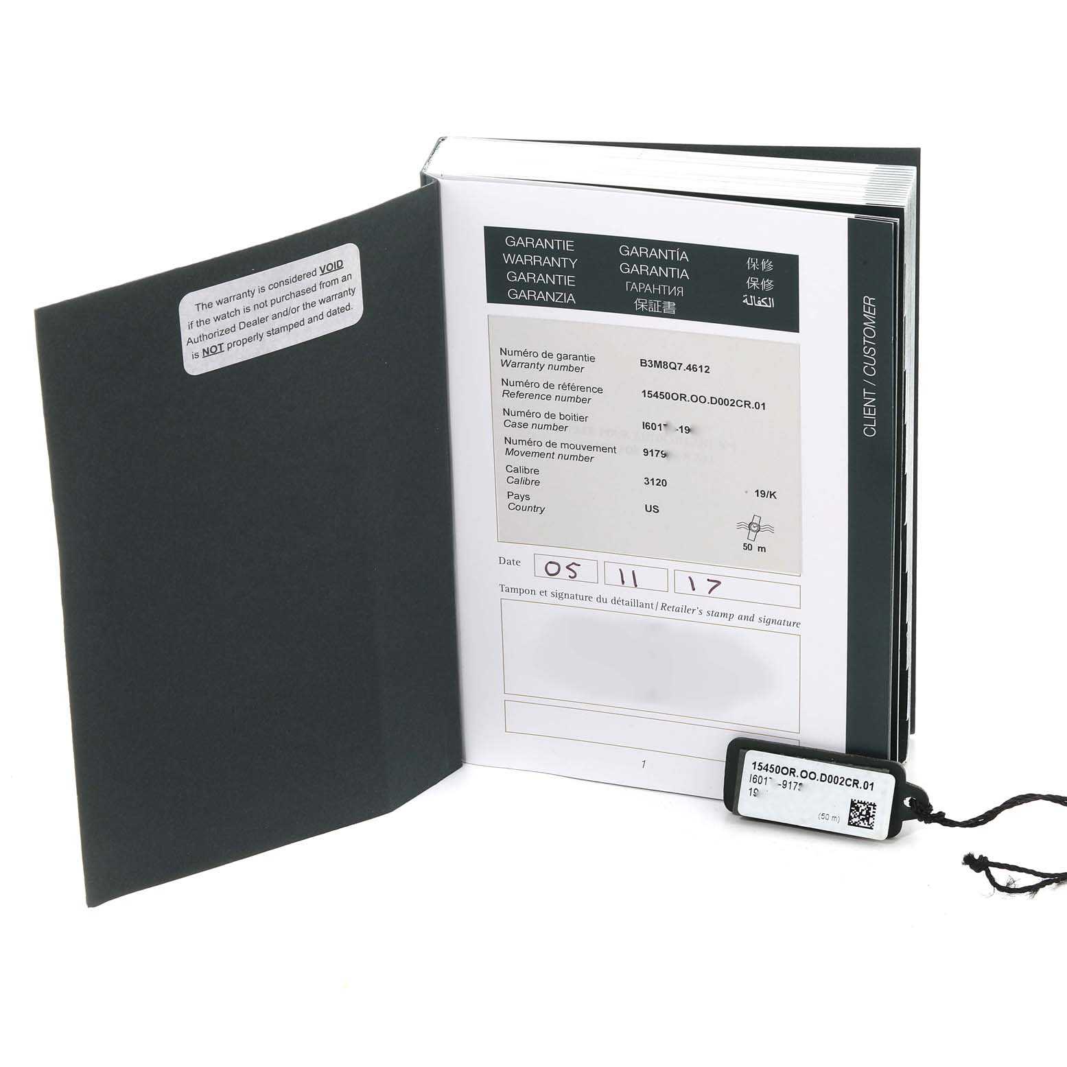 The image shows the warranty booklet and tag for an Audemars Piguet Royal Oak 15450OR.OO.D088CR.01 Men's Rose Gold Black Dial 15450OR.OO.D088CR.01 Men's Rose Gold Black Dial watch.