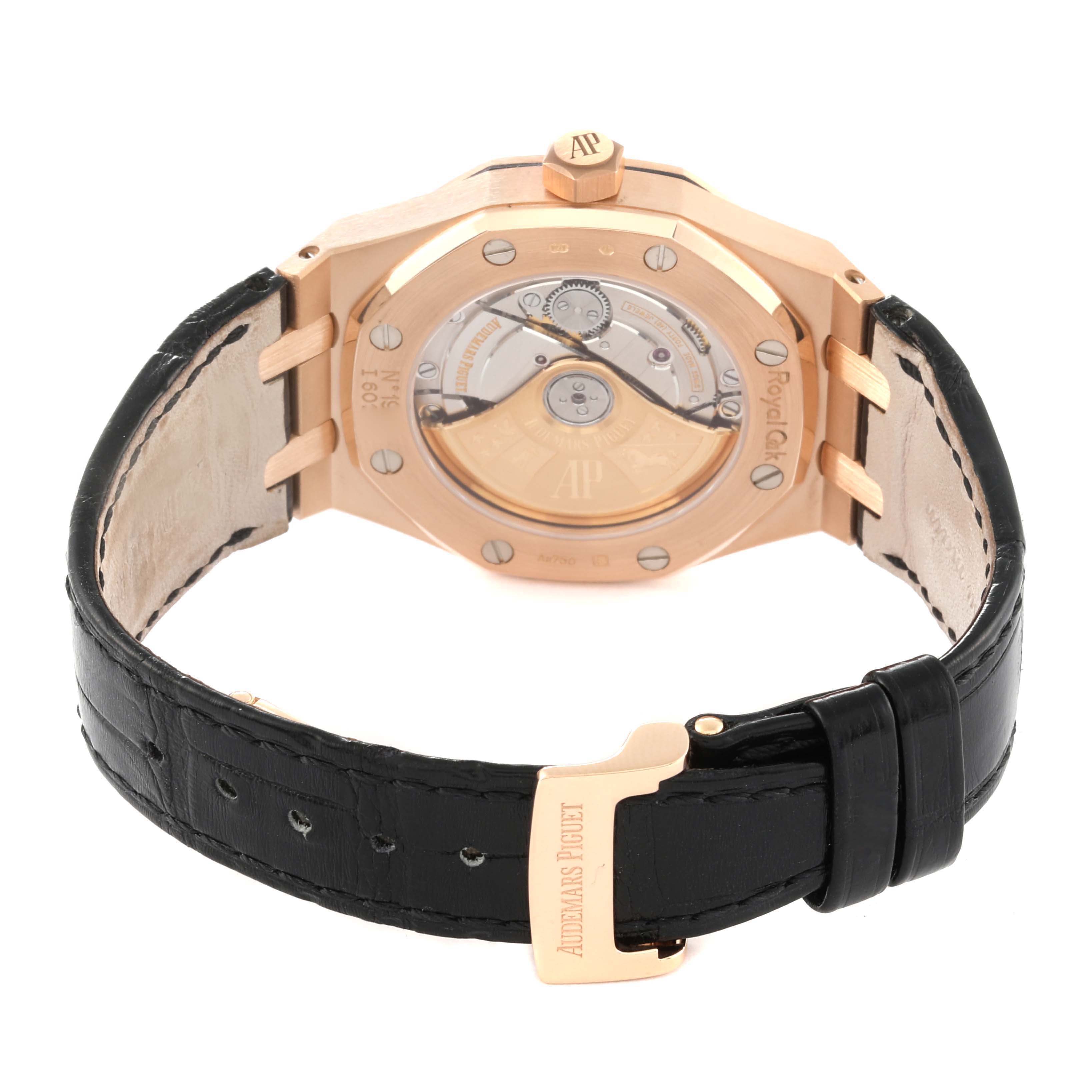 This image shows the back of the Audemars Piguet Royal Oak 15450OR.OO.D088CR.01 Men's Rose Gold Black Dial 15450OR.OO.D088CR.01 Men's Rose Gold Black Dial watch, highlighting the movement mechanism and leather strap.