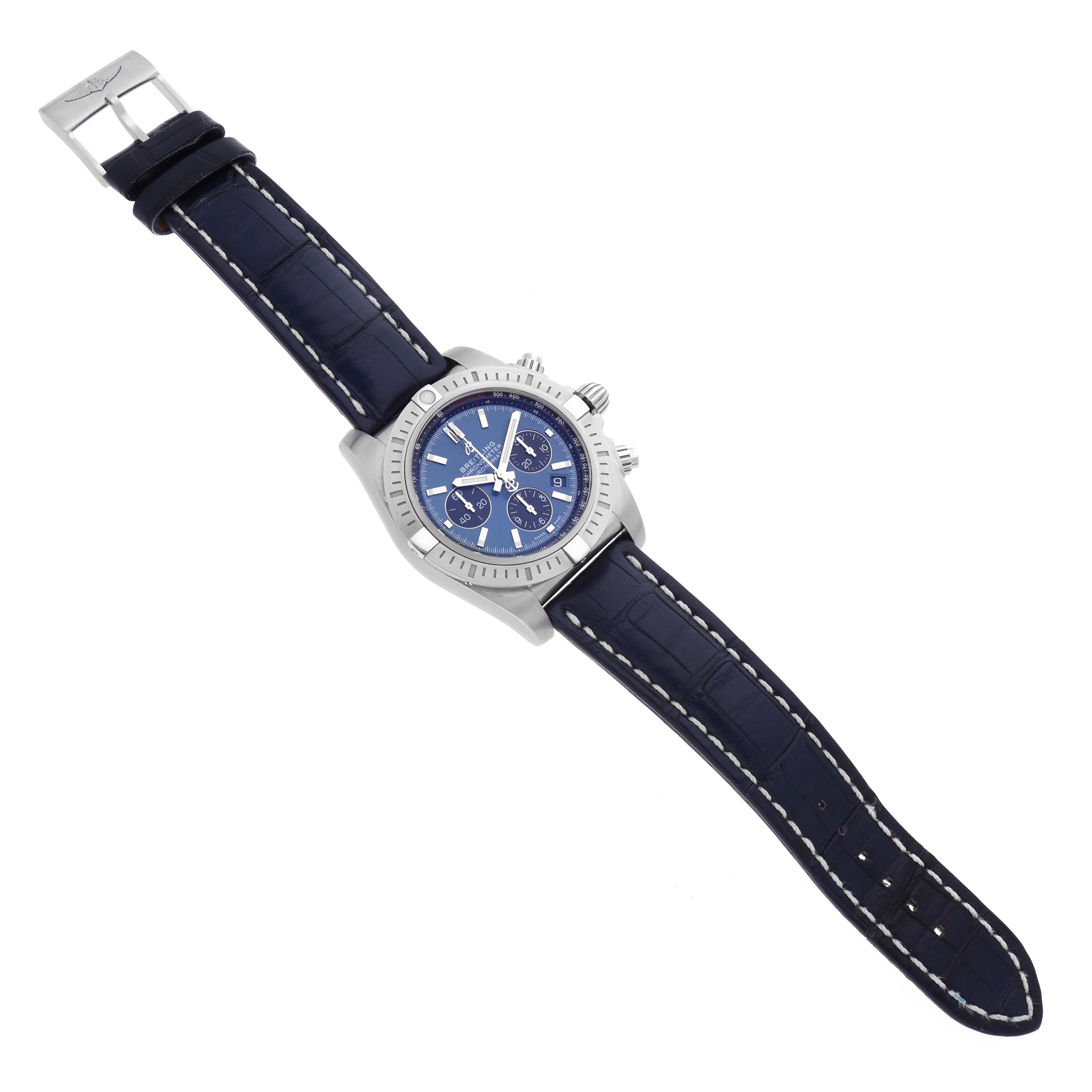 The Breitling Chronomat AB0115 Men's Stainless Steel Blue Dial AB0115 Men's Stainless Steel Blue Dial watch is shown from a top view, displaying the face, bezel, and leather strap.