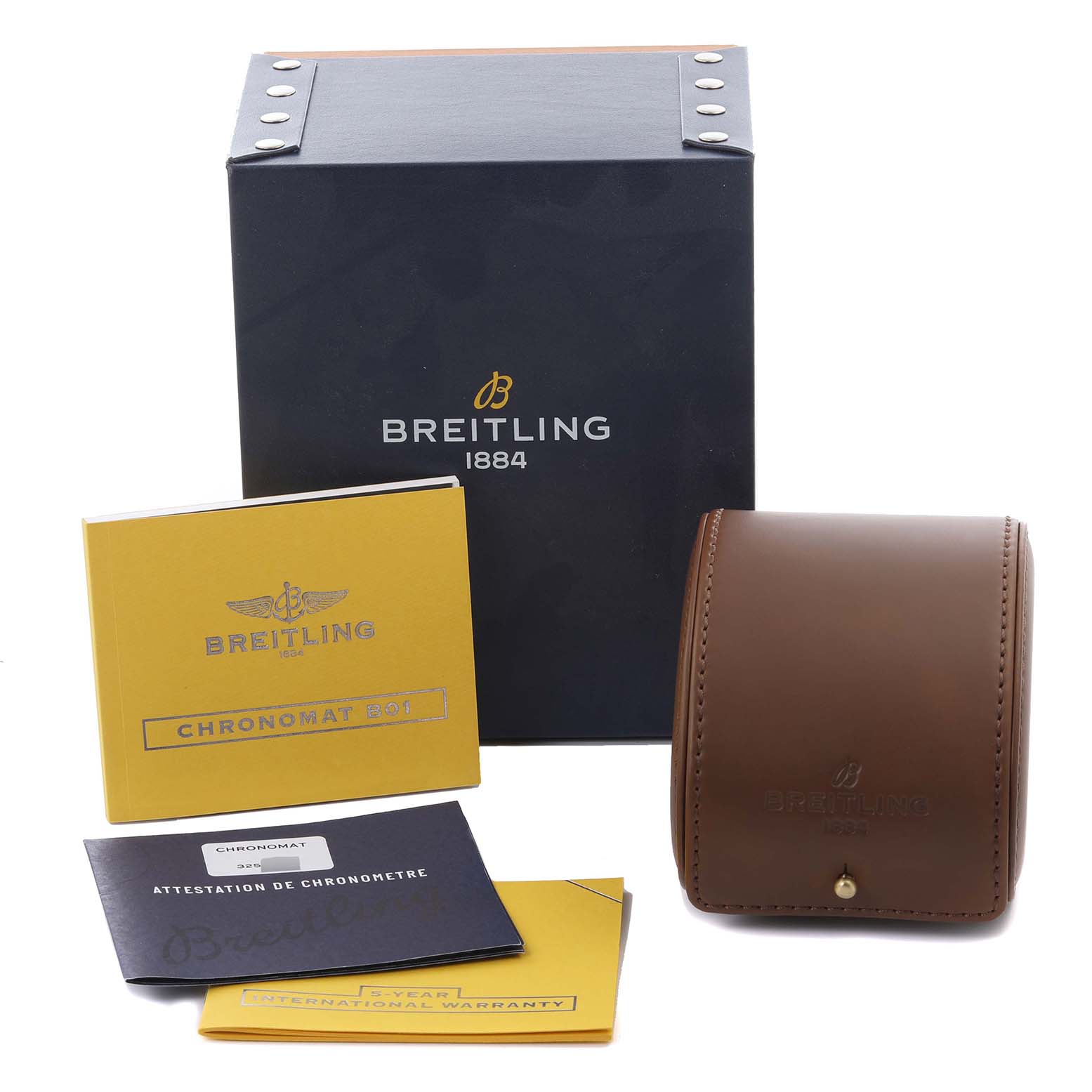 The image shows the Breitling Chronomat AB0115 Men's Stainless Steel Blue Dial AB0115 Men's Stainless Steel Blue Dial packaging, manuals, and a leather case from a front angle.