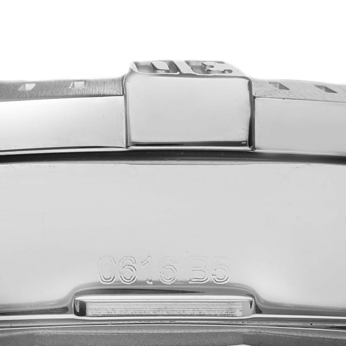 The image shows a close-up of part of the bezel and case side of a Breitling Colt A17388 Men's Stainless Steel Blue Dial A17388 Men's Stainless Steel Blue Dial watch.