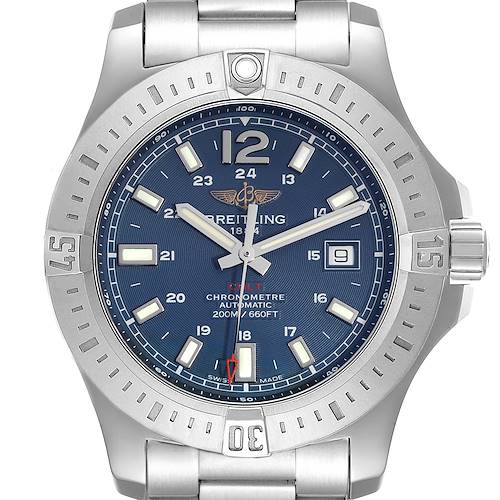 The Breitling Colt watch is shown from the front, highlighting its blue dial, hands, bezel, and part of the bracelet.