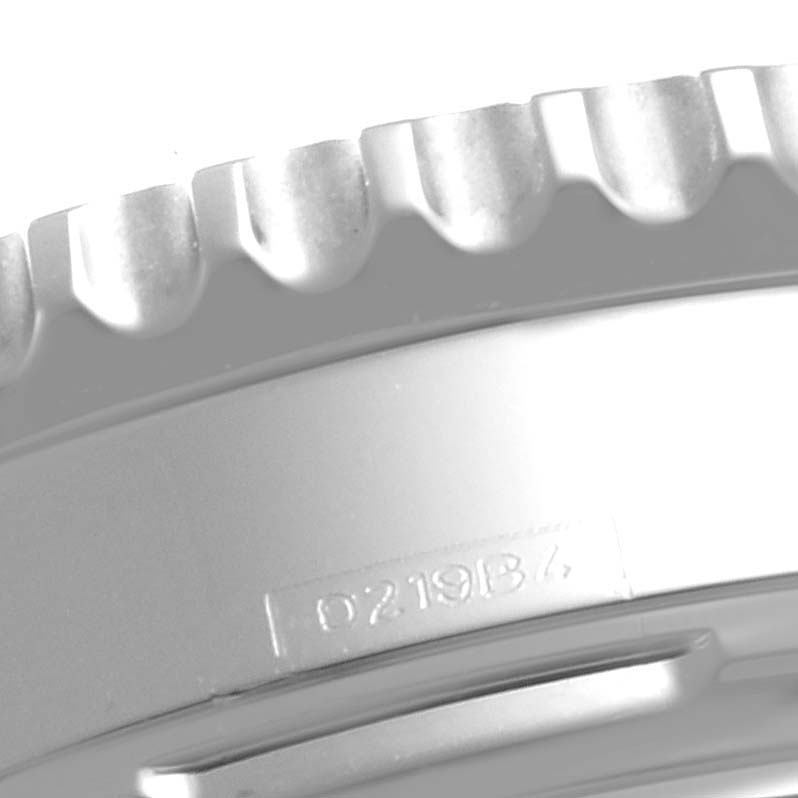 This image shows a close-up of the bezel and case side of a Breitling Navitimer AB0121 Men
s Stainless Steel Black Dial AB0121 Men
s Stainless Steel Black Dial watch.