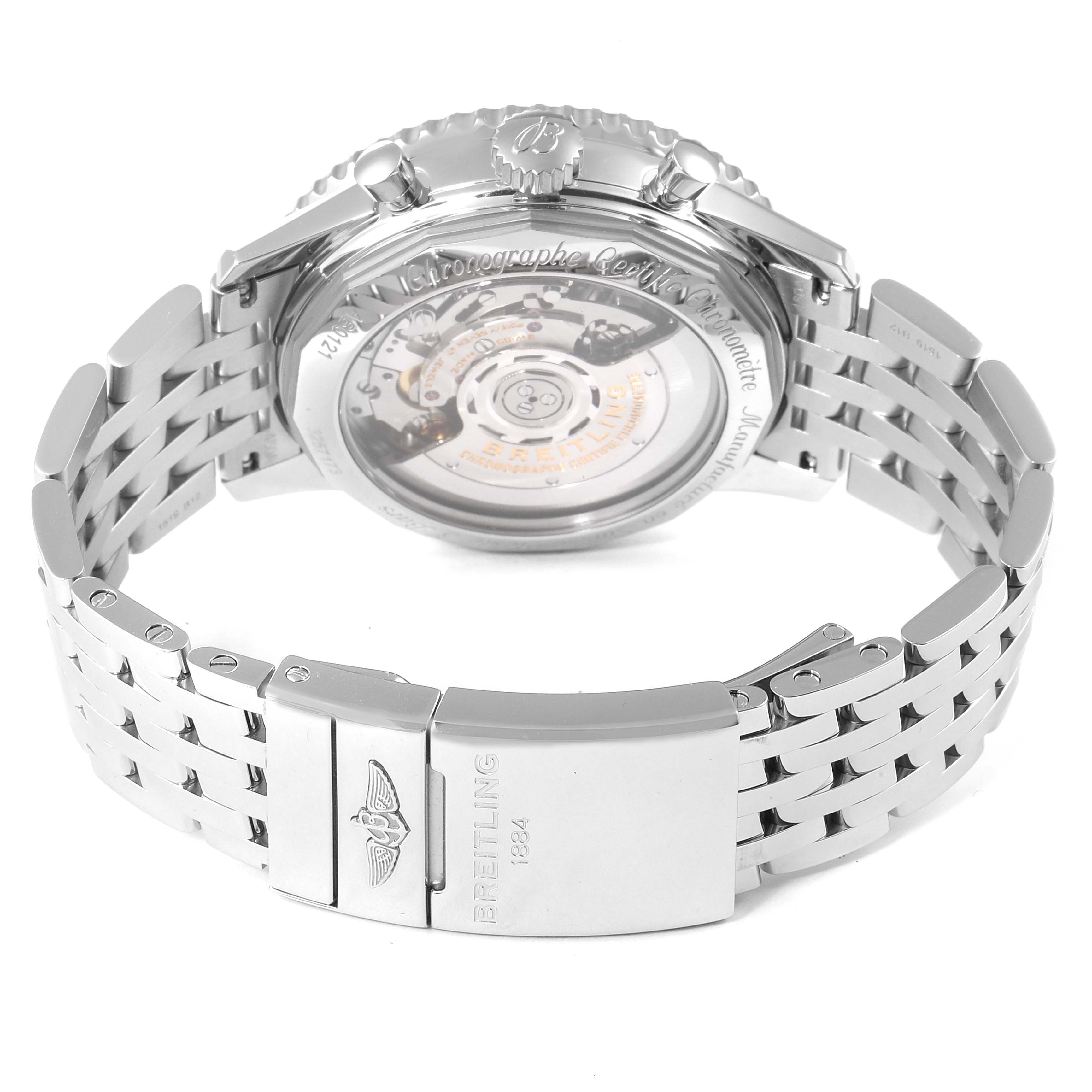 The image shows the Breitling Navitimer AB0121 Men
s Stainless Steel Black Dial AB0121 Men
s Stainless Steel Black Dial watch from the back, highlighting its transparent case back and metal bracelet with a clasp.