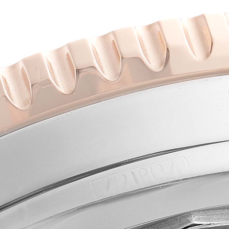 This image shows a close-up of the bezel and part of the case of the Breitling Navitimer U13324211B1X1 Men's Stainless Steel Black Dial U13324211B1X1 Men's Stainless Steel Black Dial watch.