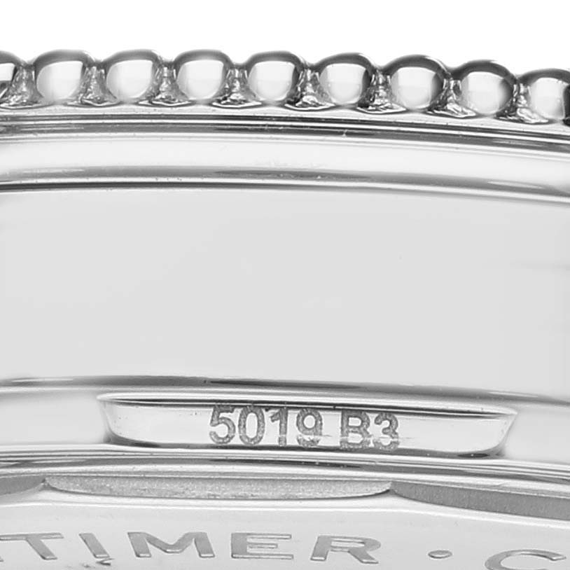 The image shows the side view of the bezel and part of the case with engravings on the Breitling Navitimer A17395 Men's Stainless Steel Blue Dial A17395 Men's Stainless Steel Blue Dial Automatic 35.