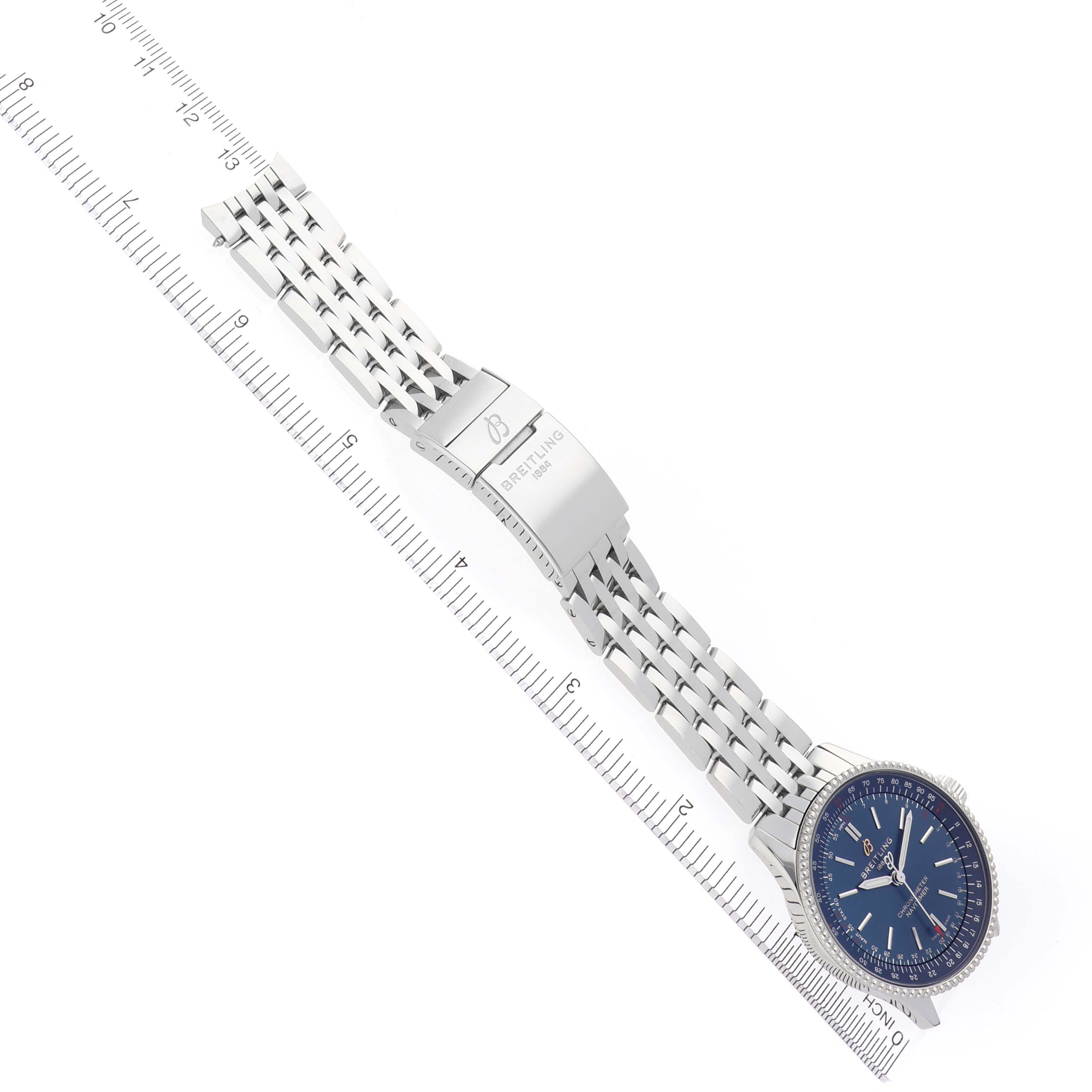 The image shows a Breitling Navitimer A17395 Men's Stainless Steel Blue Dial A17395 Men's Stainless Steel Blue Dial Automatic 35 with a blue dial, band, and clasp displayed from an overhead angle.