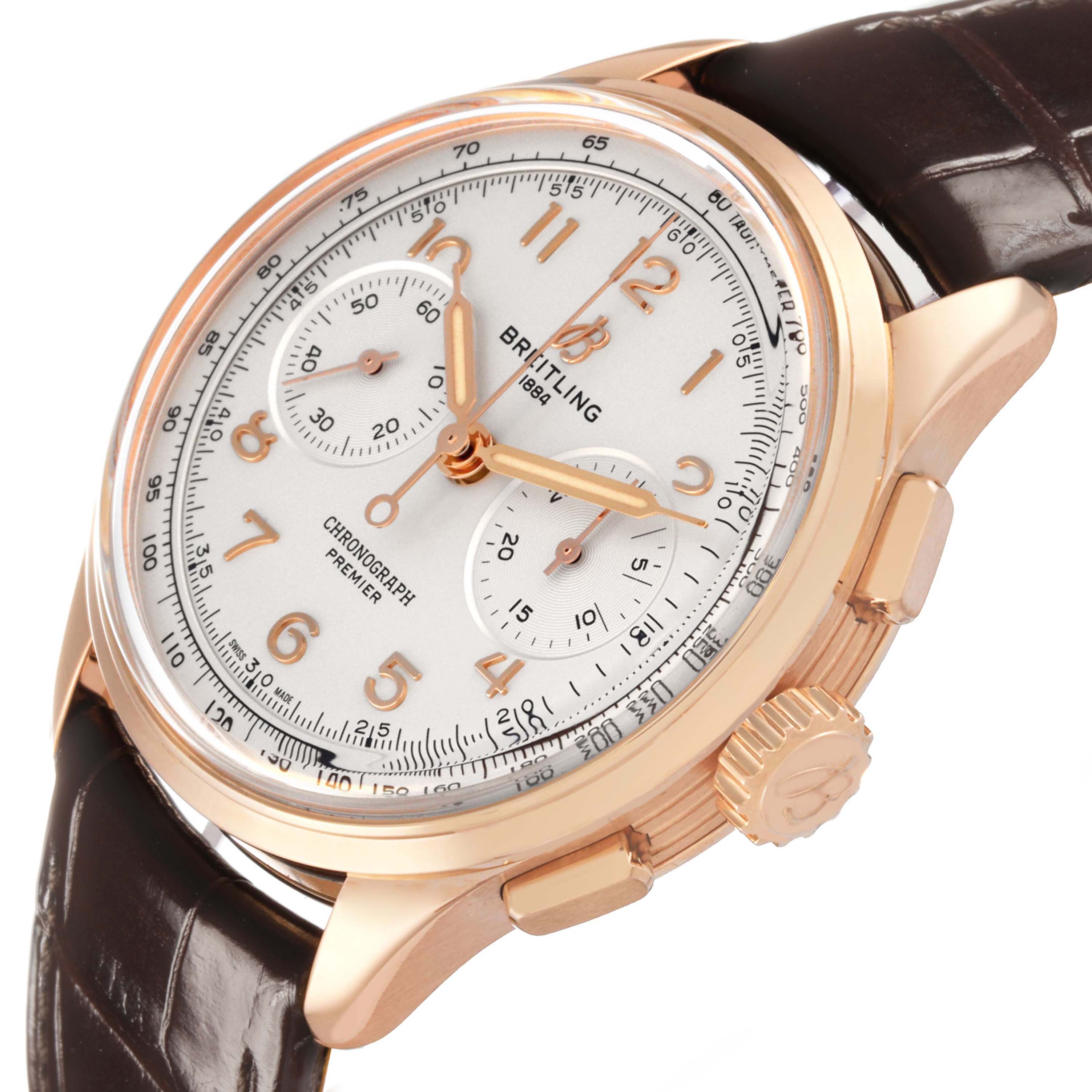 The Breitling Premier RB0930 Men's Rose Gold Silver Dial watch is shown at an angled view, highlighting its dial, case, crown, and leather strap.