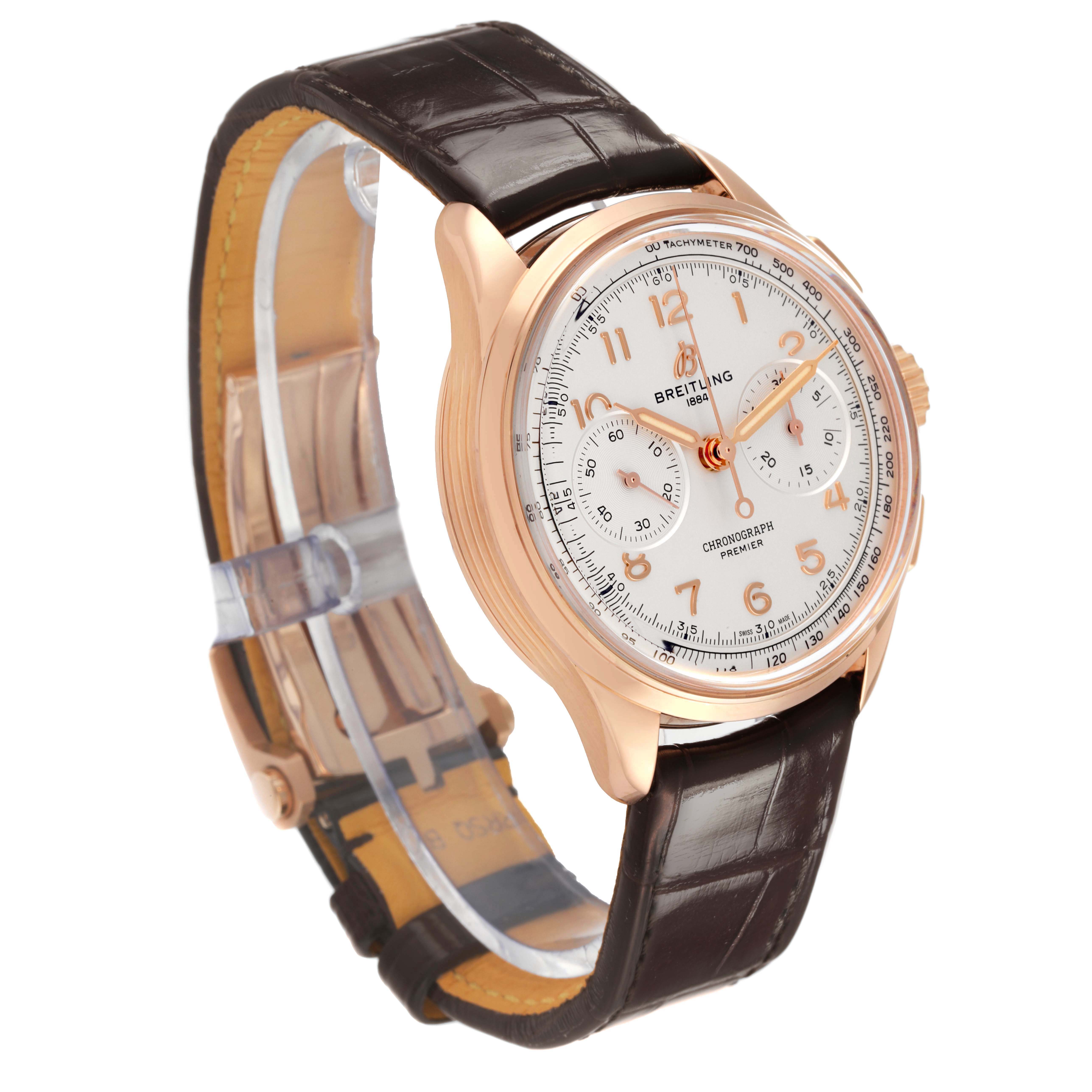 The Breitling Premier RB0930 Men's Rose Gold Silver Dial watch is shown at a three-quarter angle, displaying the dial, case, crown, and strap.