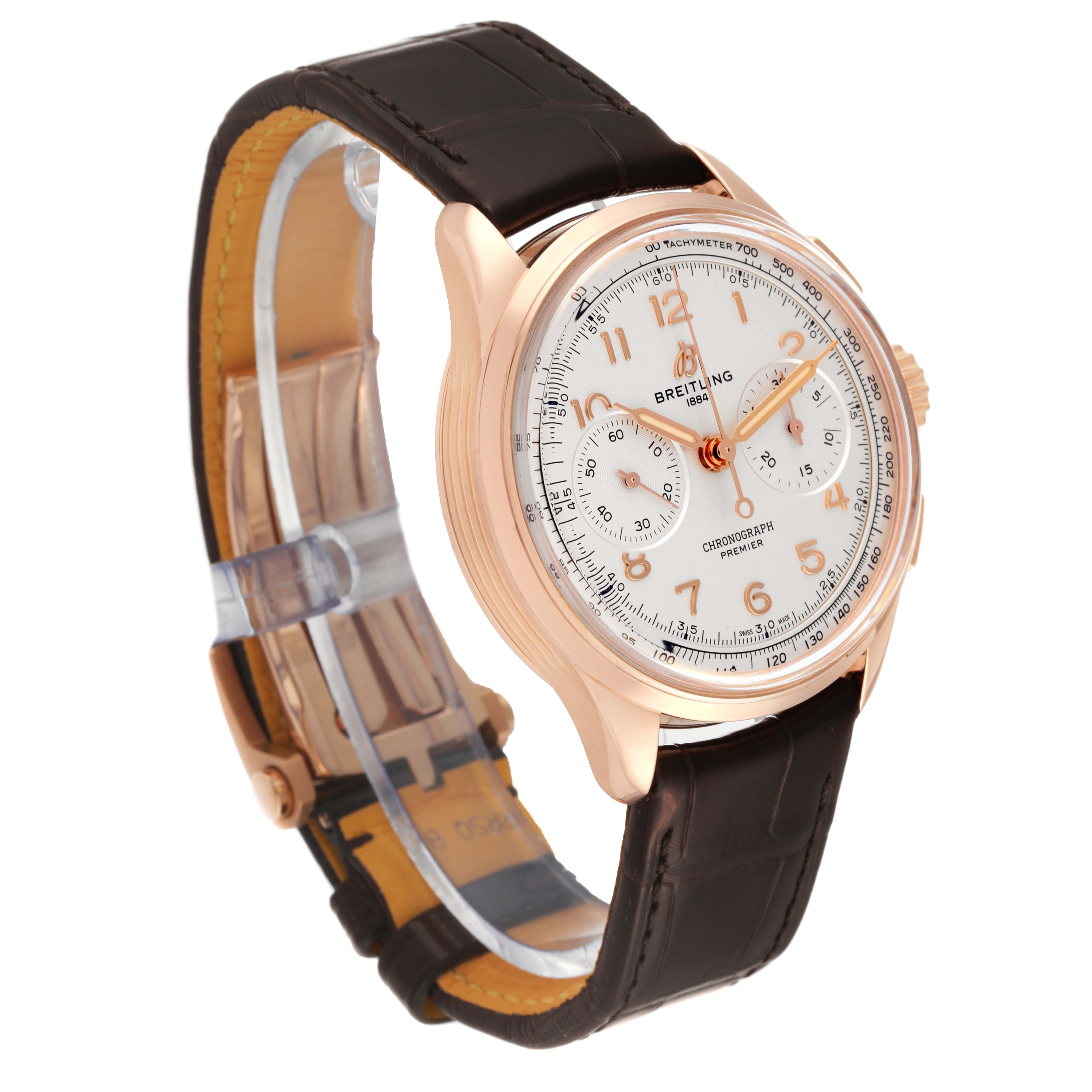 The image shows a Breitling Premier RB0930 Men's Rose Gold Silver Dial RB0930 Men's Rose Gold Silver Dial model watch from an angle displaying the dial, strap, and clasp.