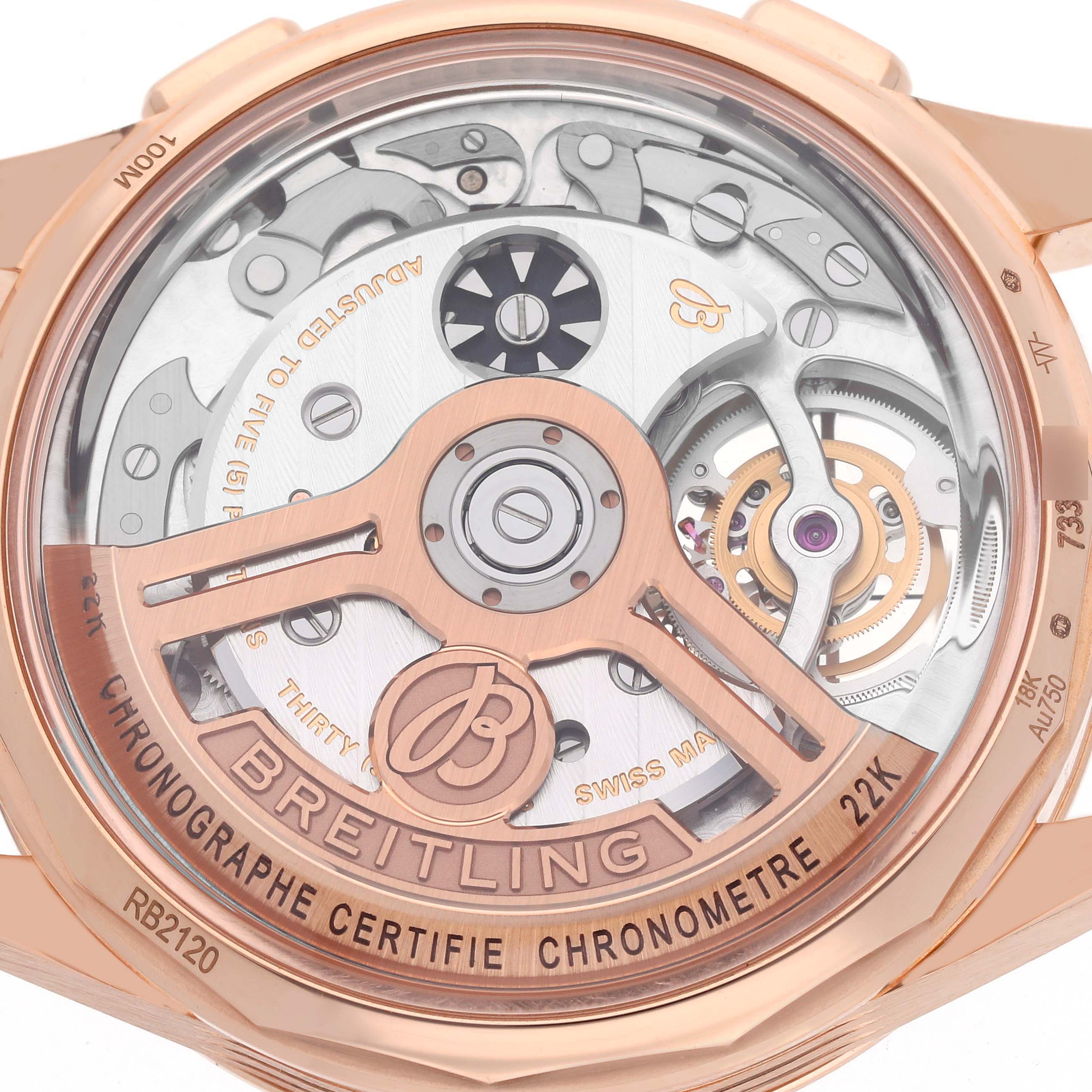 This image shows the transparent case back of a Breitling Premier RB2120 Men's Rose Gold Silver Dial RB2120 Men's Rose Gold Silver Dial watch, revealing its intricate movement.