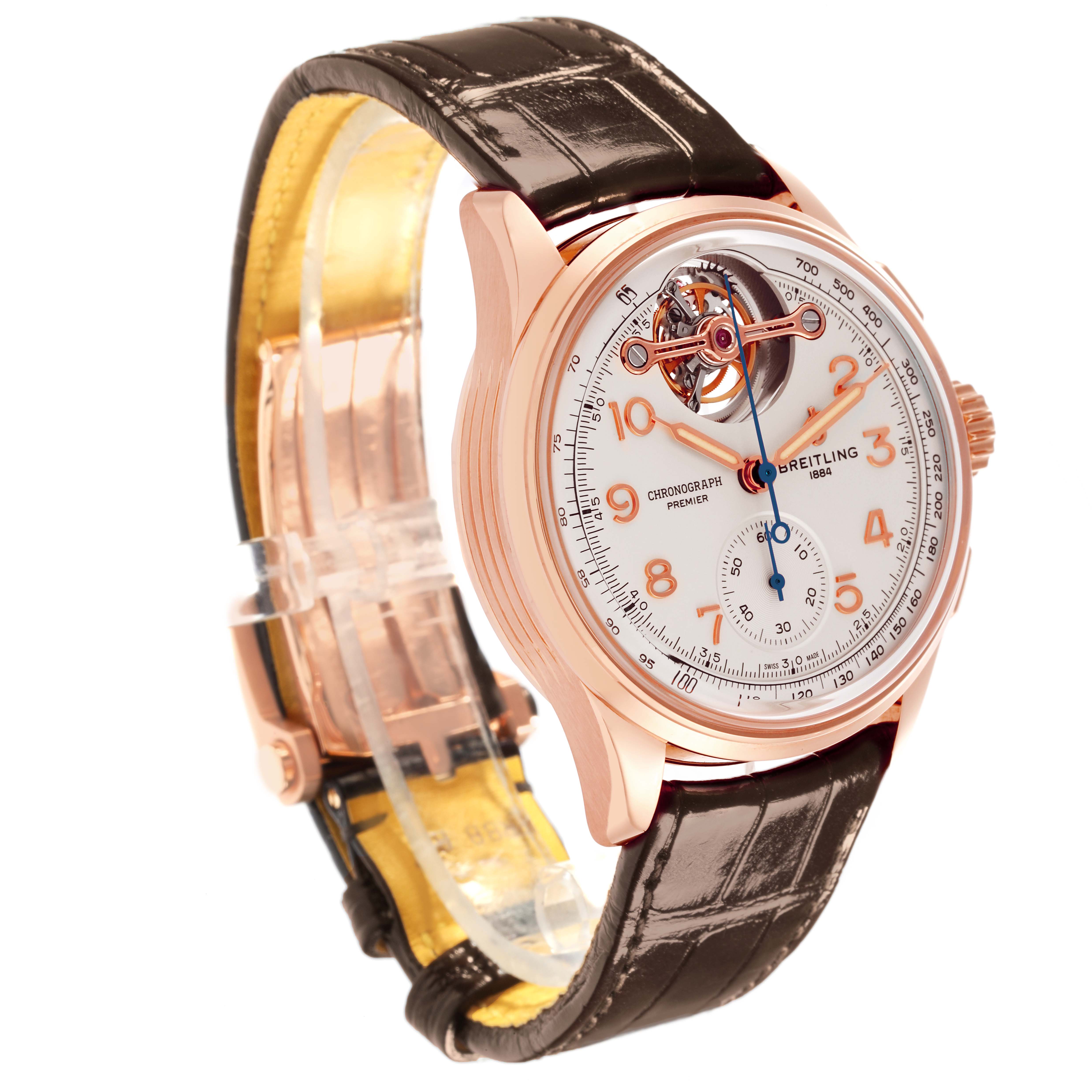 The Breitling Premier RB2120 Men's Rose Gold Silver Dial RB2120 Men's Rose Gold Silver Dial watch is shown at an angle highlighting the face, strap, and case in rose gold.