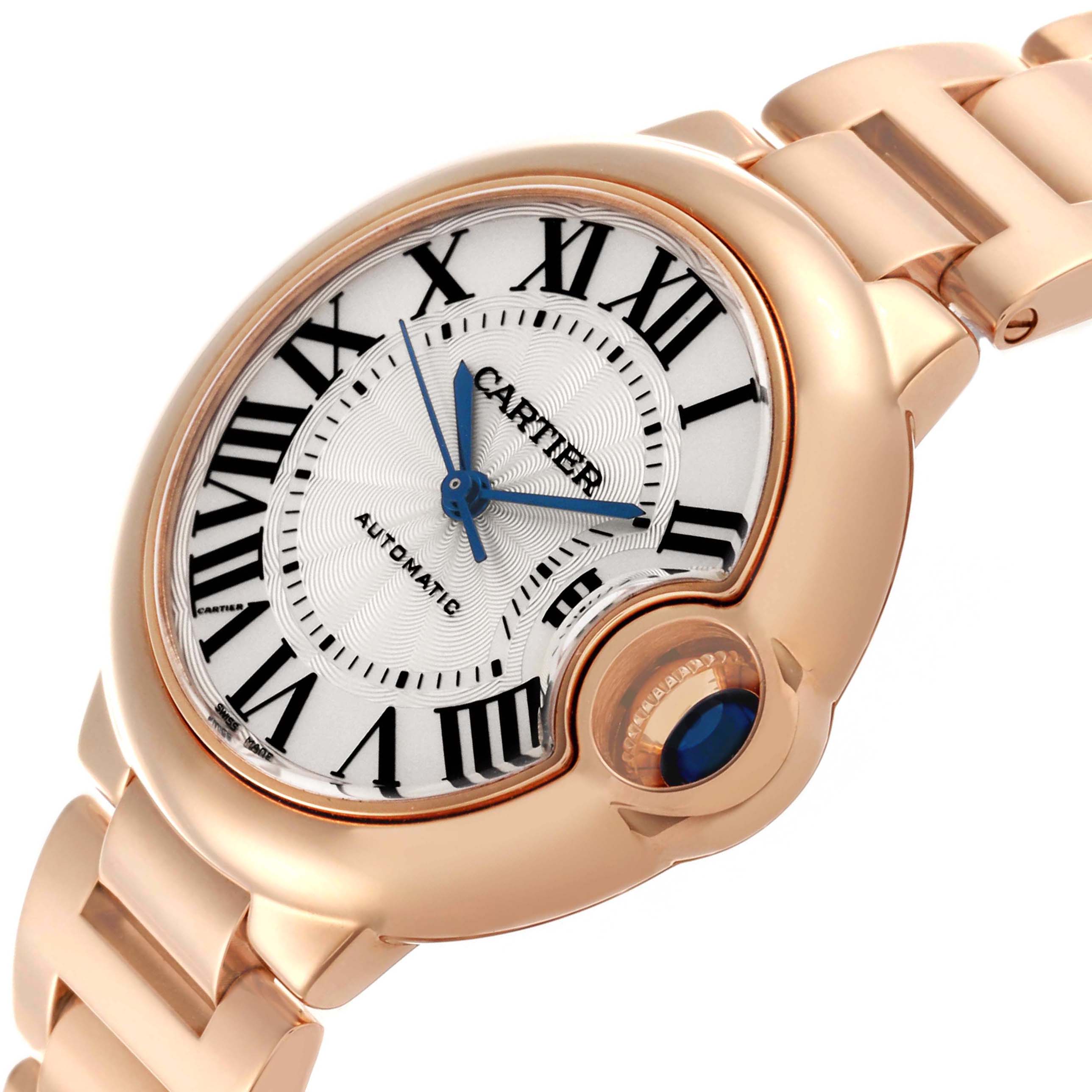 This Cartier Ballon Bleu WGBB0042 Women's Rose Gold Silver Dial watch is shown at an angled view, highlighting the round case, Roman numerals, blue hands, and crown.