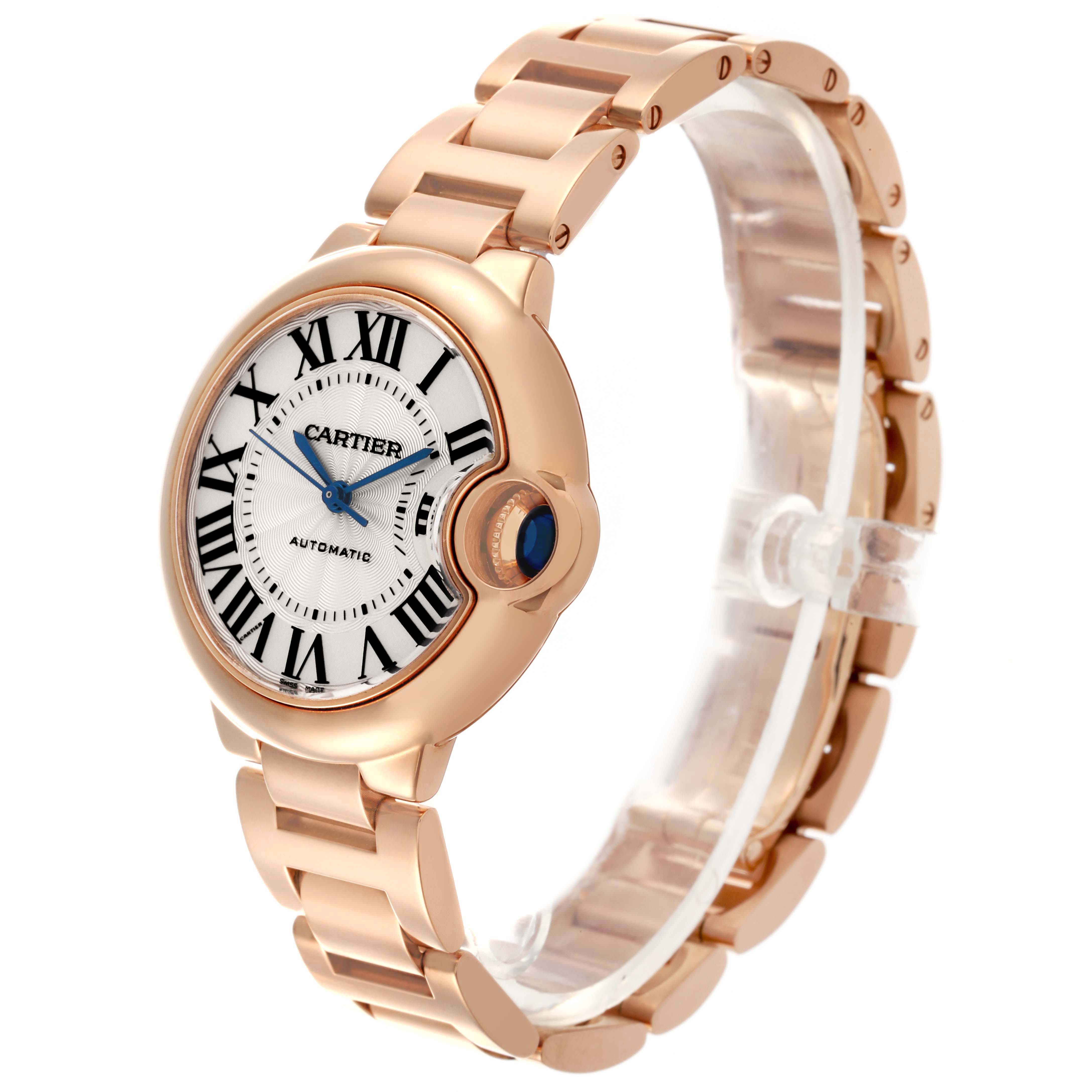 The Cartier Ballon Bleu WGBB0042 Women's Rose Gold Silver Dial watch is shown at an angle highlighting the face, crown, and bracelet.