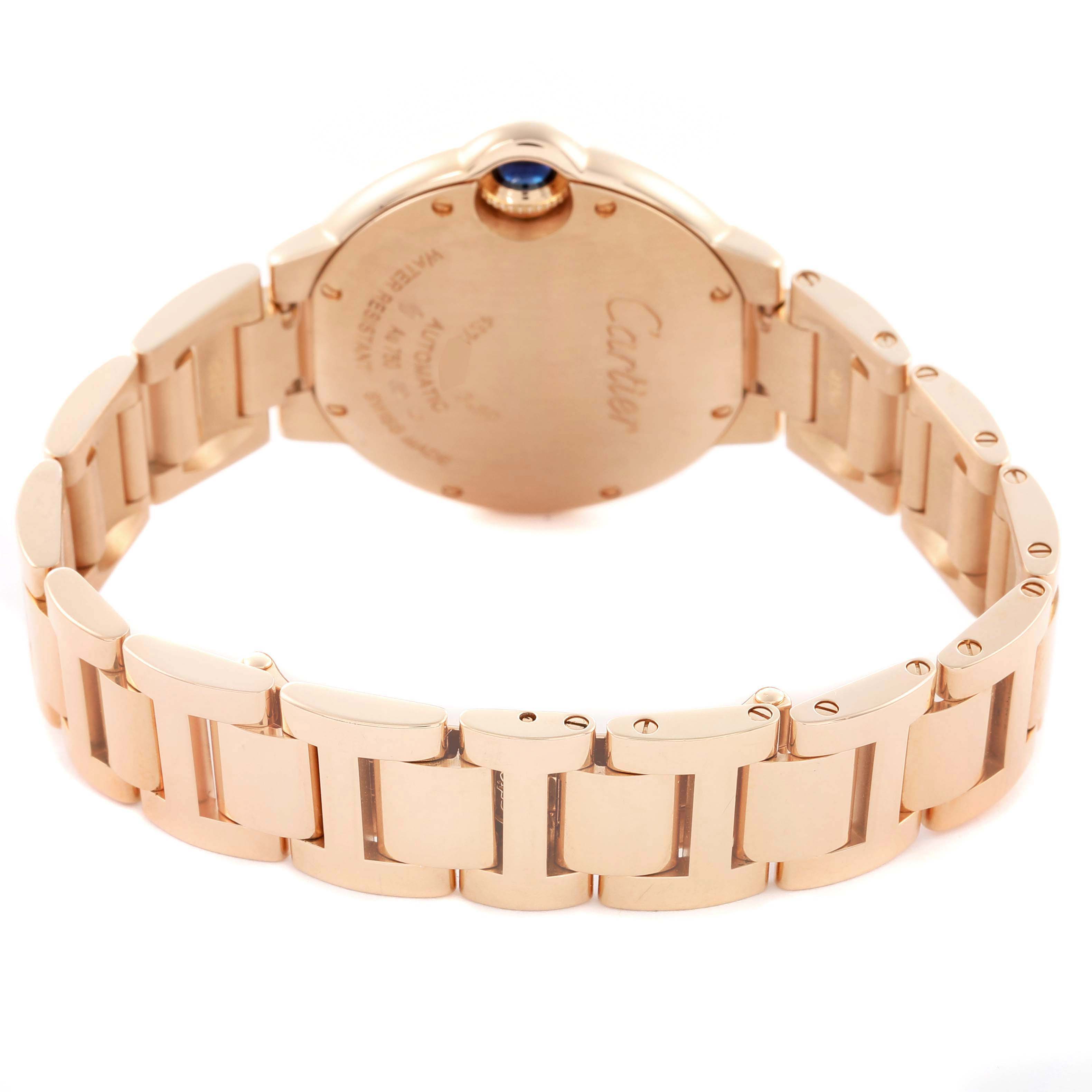 The Cartier Ballon Bleu WGBB0042 Women's Rose Gold Silver Dial watch is shown from the back, highlighting the case back and bracelet links.