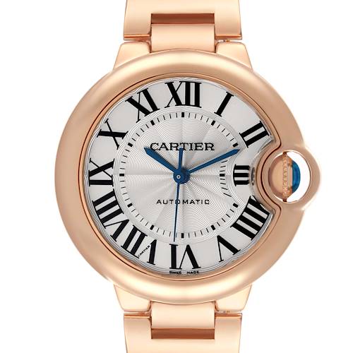 The Cartier Ballon Bleu watch is shown from the front, highlighting the dial, Roman numerals, hands, and crown.