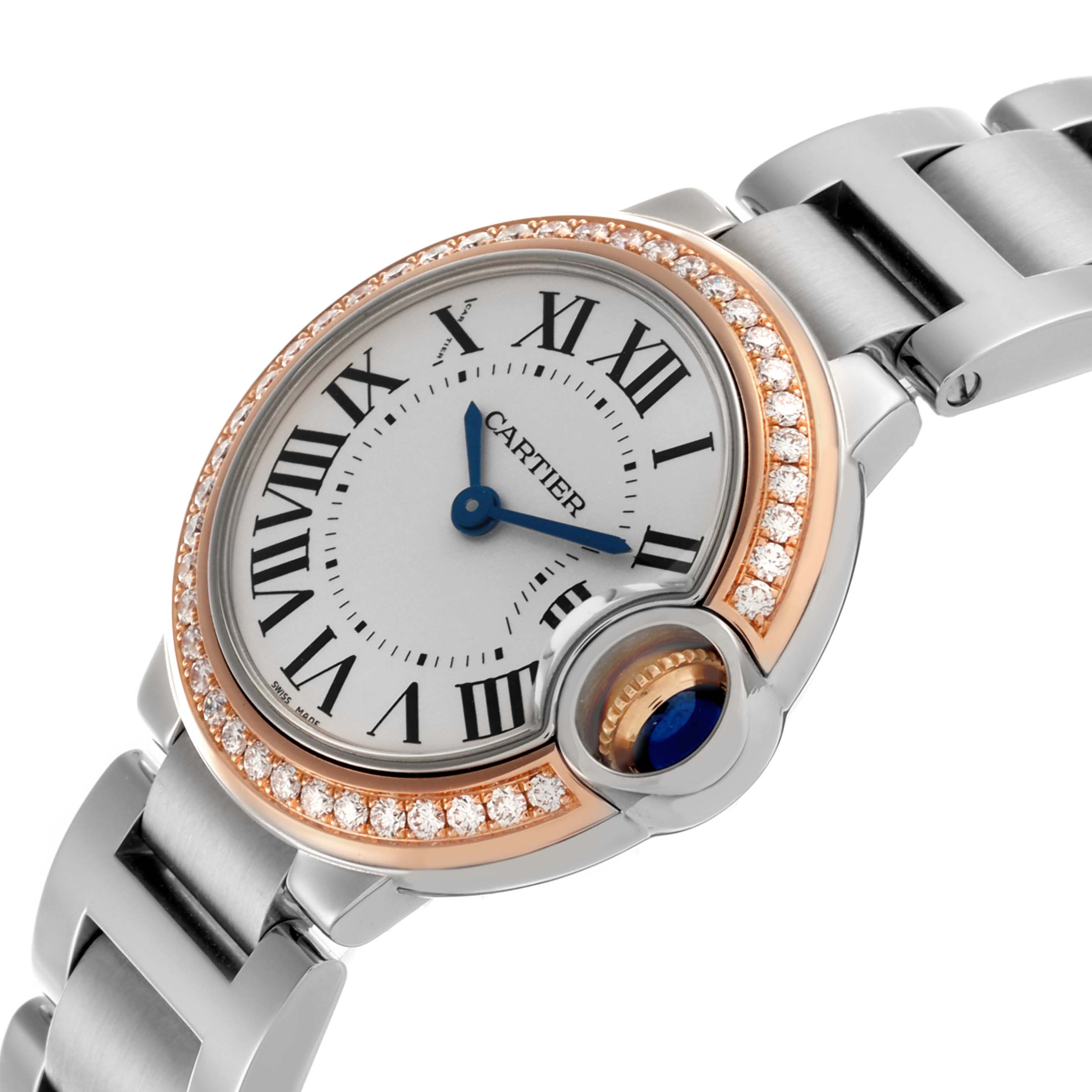 The Cartier Ballon Bleu WE902079 Women's Steel and Gold (two tone) Silver Dial WE902079 Women's Steel and Gold (two tone) Silver Dial watch is shown at an angled view, highlighting the face, Roman numerals, blue hands, and diamond-set bezel.