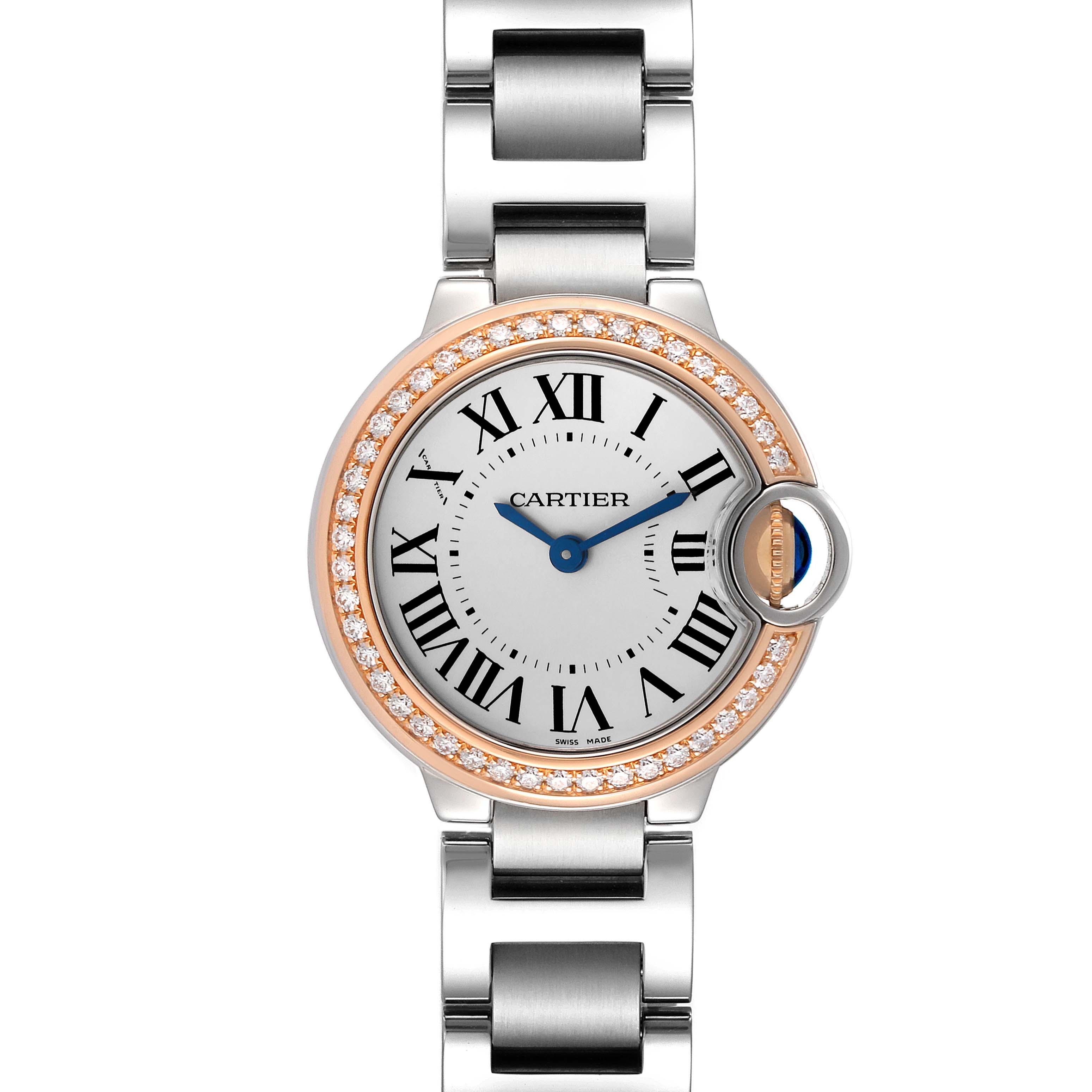 The Cartier Ballon Bleu WE902079 Women's Steel and Gold (two tone) Silver Dial WE902079 Women's Steel and Gold (two tone) Silver Dial watch is shown from a top-down angle, highlighting its dial, diamond bezel, and part of the bracelet.