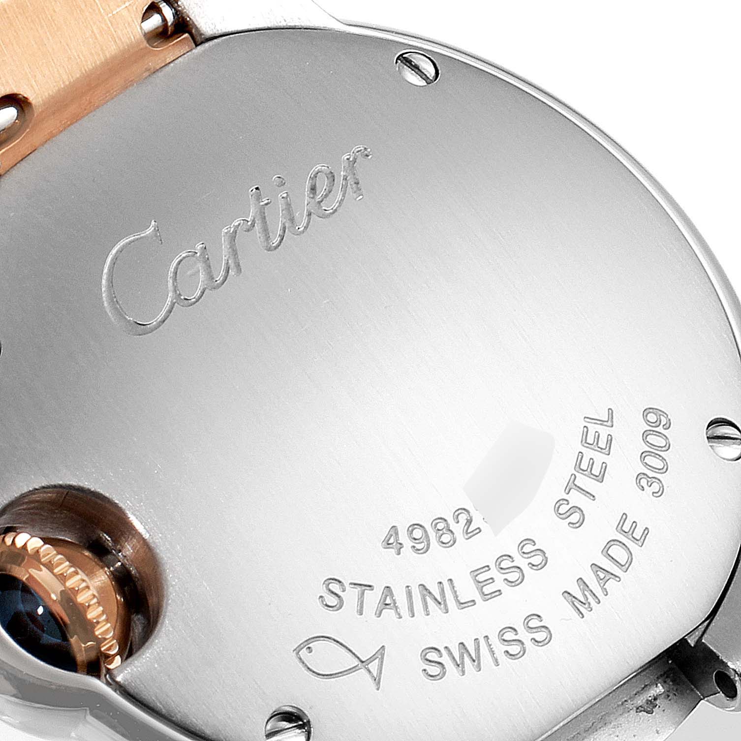 The image shows the back of a Ballon Bleu model by Cartier, highlighting the stainless steel case and engravings.
