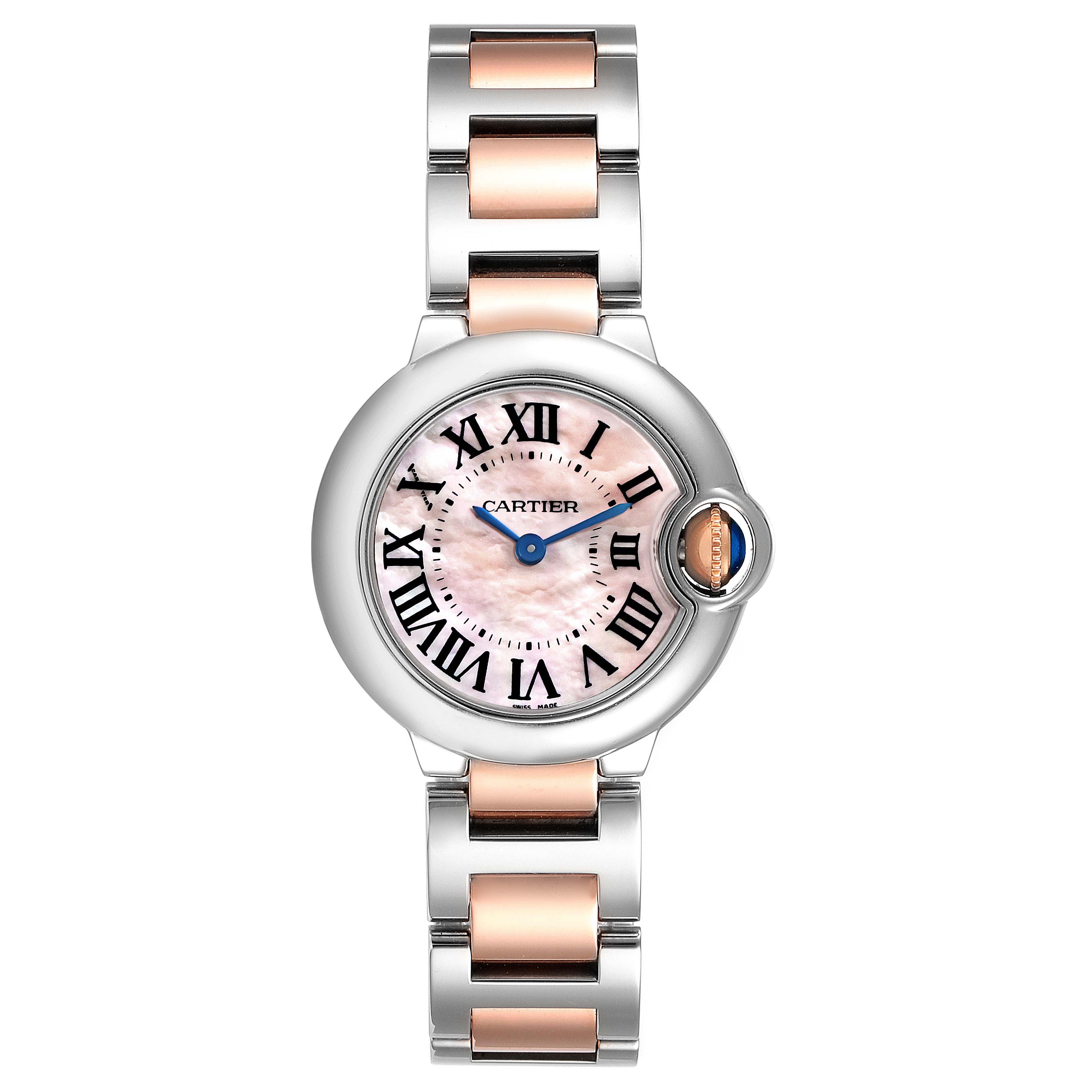 The Cartier Ballon Bleu W6920034 Women
s Steel and Gold (two tone) Mother of Pearl Dial W6920034 Women
s Steel and Gold (two tone) Mother of Pearl Dial watch is shown from a front angle, highlighting its face, bracelet, and distinctive crown.